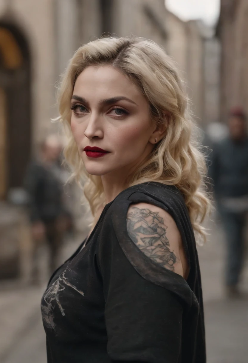 Madonna, dressed in street wear, arm tattoos, in graffitied streets, staring