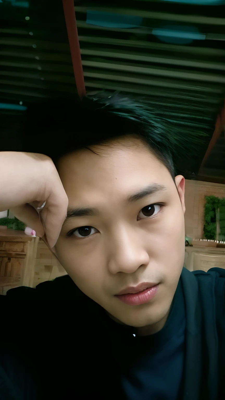 there is a man that is holding a cell phone up to his ear, 2 7 years old, 2 8 years old, 2 3 years old, 2 9 years old, 2 2 years old, with accurate face, showing forehead, 2 4 years old, asian male, thawan duchanee, 21 years old, good looking face, forehead only