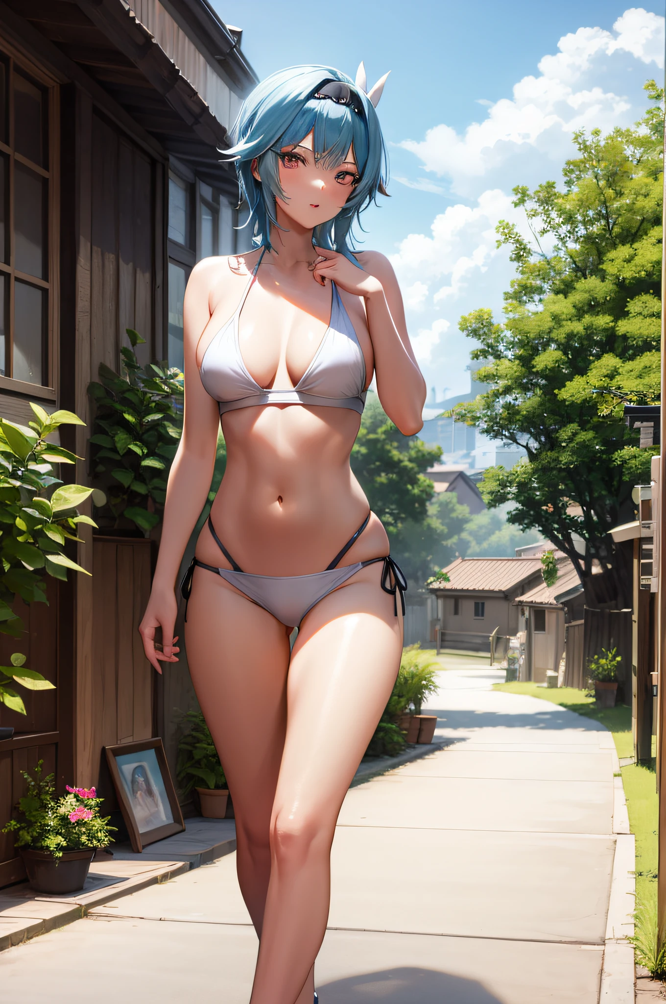 bikini en la playa, sentada en la arena
