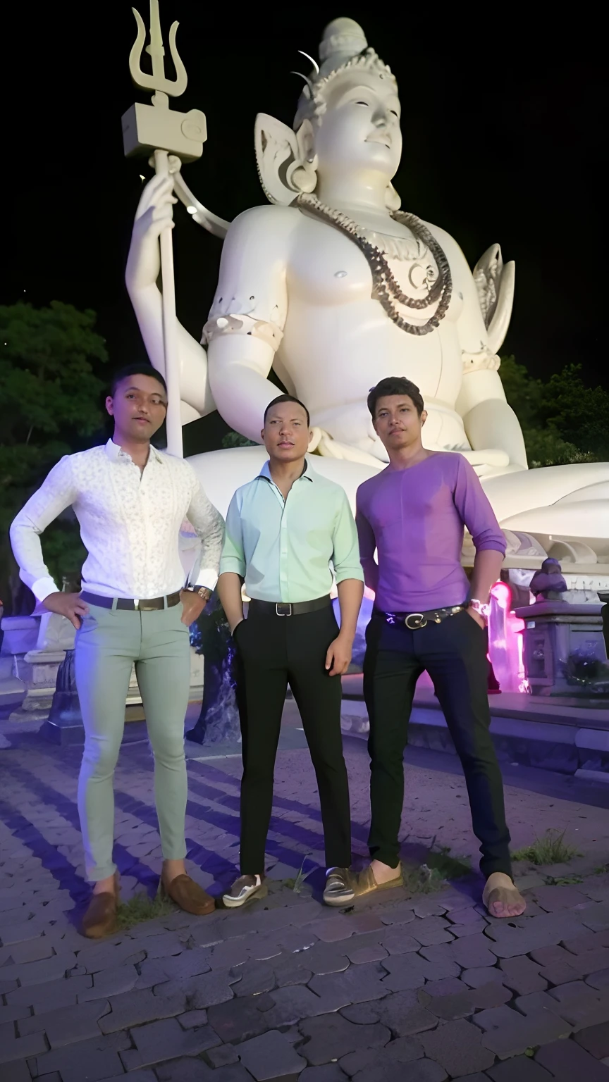 three men standing in front of a statue of a hindu god, in front of the temple, in front of a temple, at night time, candid picture, stylish pose, photo taken at night, at khajuraho, photo taken in 2 0 2 0, during night, taken with canon 8 0 d, very artistic pose, full body photogenic shot, at nighttime