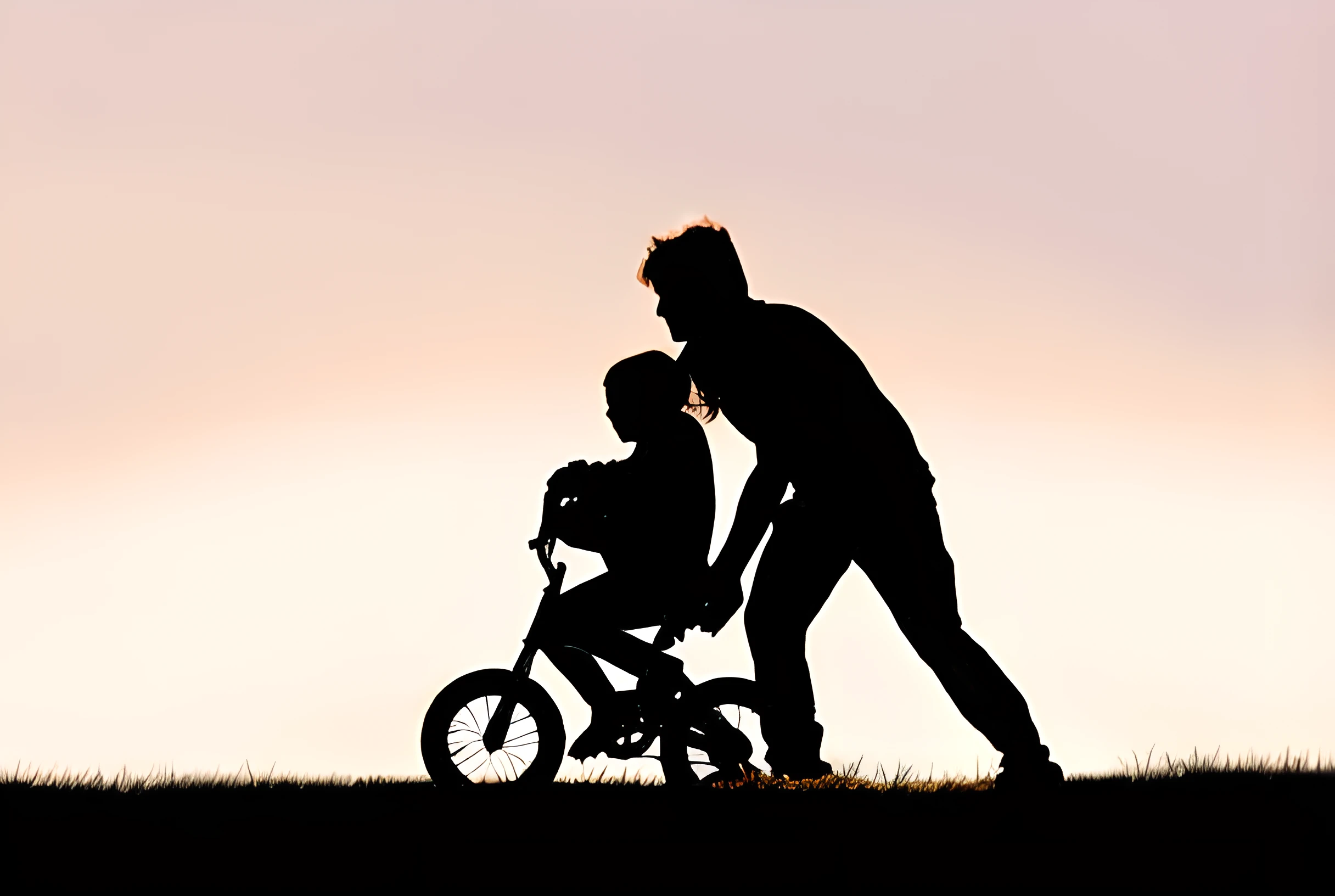 Teaching my daughter to ride her bike at sunset