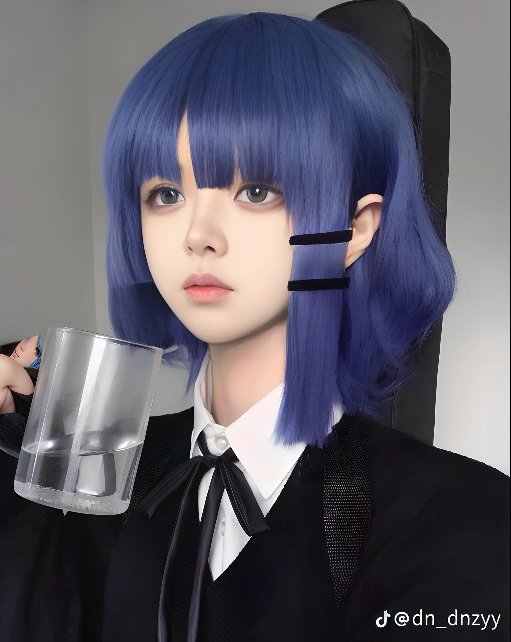 there is a woman with blue hair holding a glass of water, 1 7 - year - old anime goth girl, anime girl in real life, pretty girl with blue hair, beautiful blue haired girl, girl with blue hair, with blue hair, anime inspired, blue head, black hime cut hair, short blue haired woman, dark blue hair, portrait anime space cadet girl