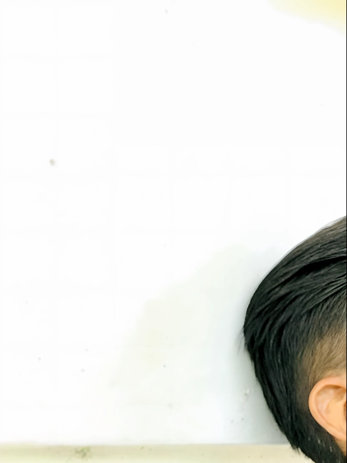 araffe man sitting against a wall with his hands on his knees, khyzyl saleem, kyza saleem, very clear picture, very very low quality picture, candid picture, wearing a kurta, by Riza Abbasi, looking away from camera, around 1 9 years old, taken with sony alpha 9, thoughtful expression