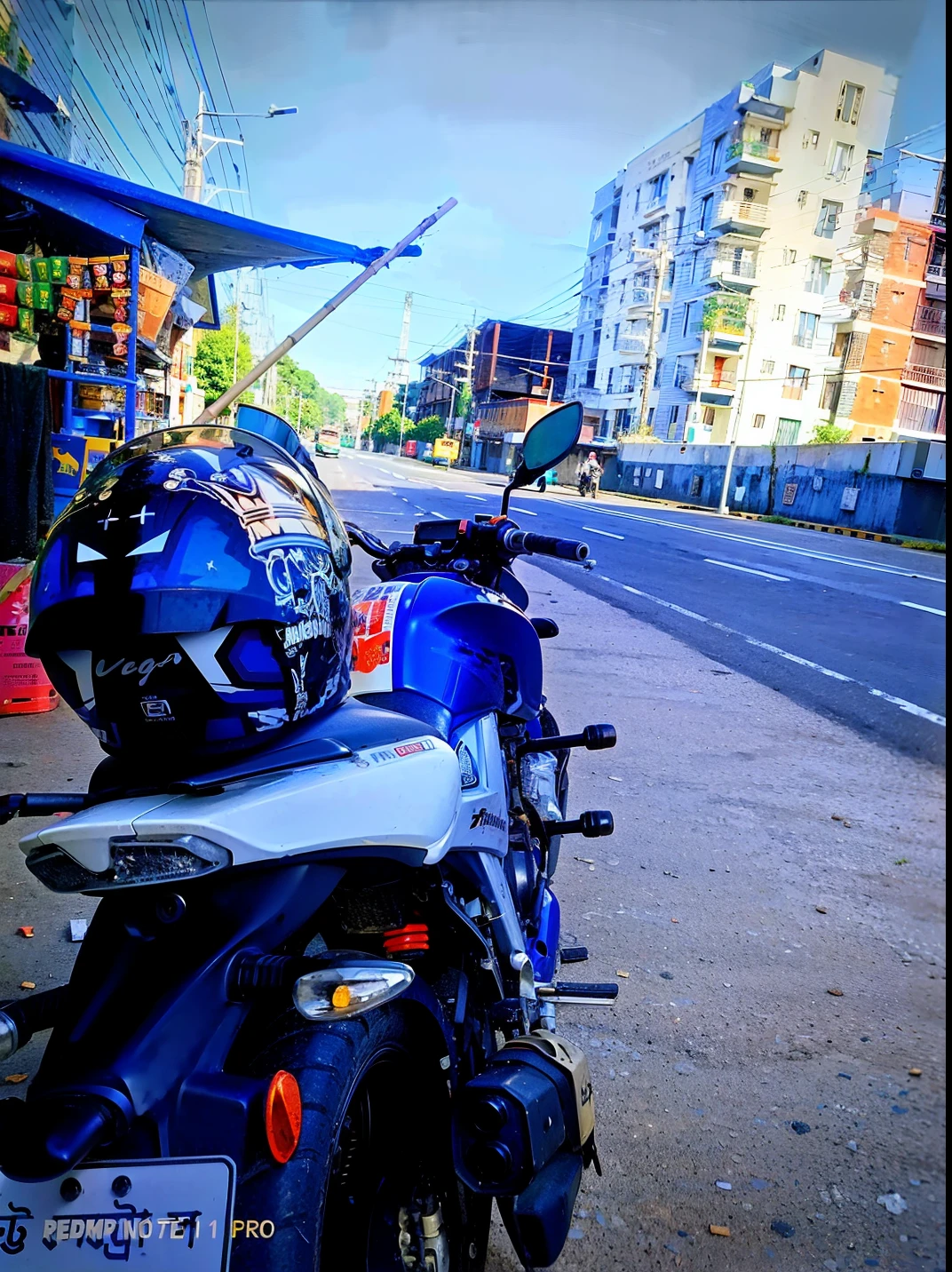 motorcycle parked on the side of the road with a helmet on the back, helmet view, touring, taken with the best dlsr camera, one motorbike in center of frame, riding on the road, without helmet, taken in 2 0 2 0, riding a motorbike down a street, taken with sony alpha 9, shot with iphone 1 0, color picture