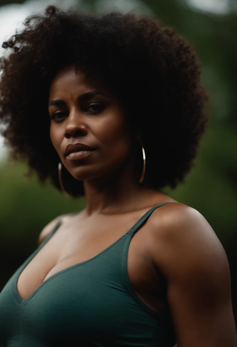 Portrait of a slim big breasted black woman with sweaty skin, curly afro