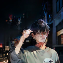 Male, short black hair, delicate face, black sweatshirt (cat pattern), scratching head action, city street background