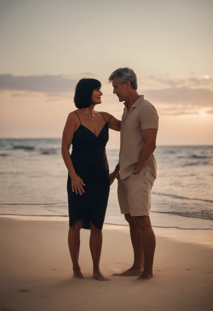 tanned mature woman, black hair with bangs, having sex standing up with young man on the beach