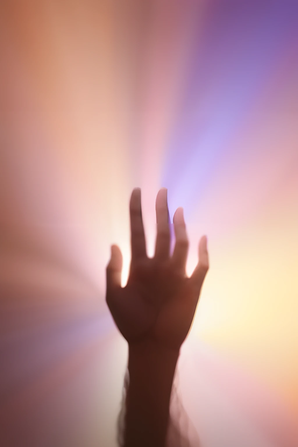 Polychromatic waves under the hand, colorful waves coming out of the hand