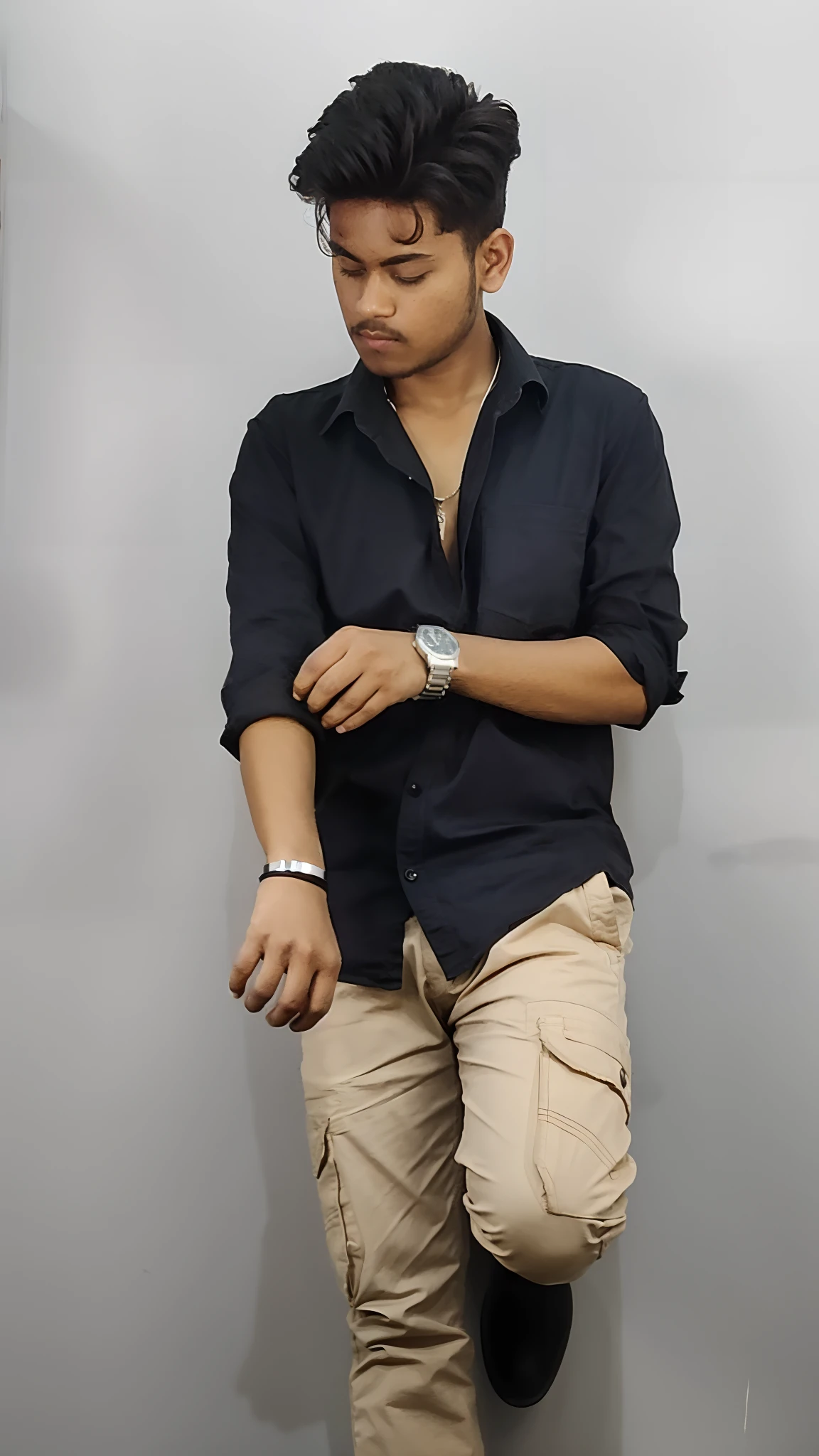 Change its background to white color wall and place a white colored plant pot next to me. And there is no need to change the face and outfit.