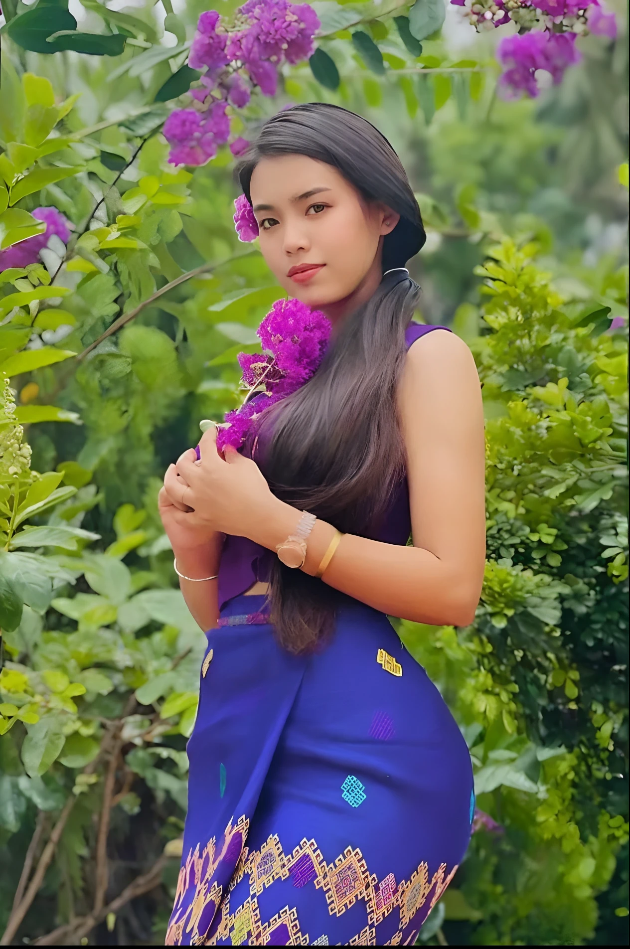 a close up of a woman in a blue dress holding a purple flower, traditional beauty, nivanh chanthara, with flowers, south east asian with long, with lovely look, in style of lam manh, assamese aesthetic, very beautiful girl, beautiful young himalayan woman, blue colored traditional wear, a young asian woman, beautiful himalayan woman
