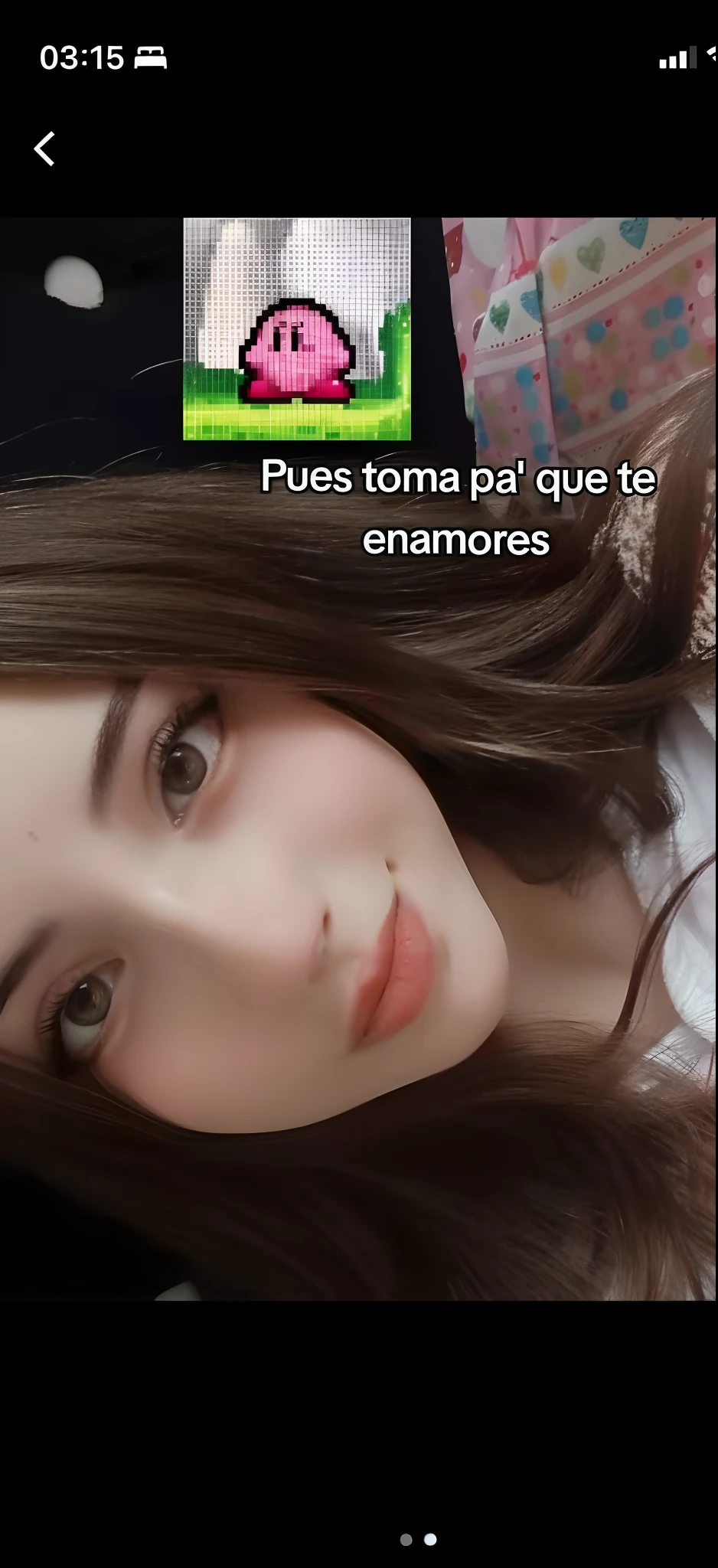 She is taking a selfie in her bed, just in thong