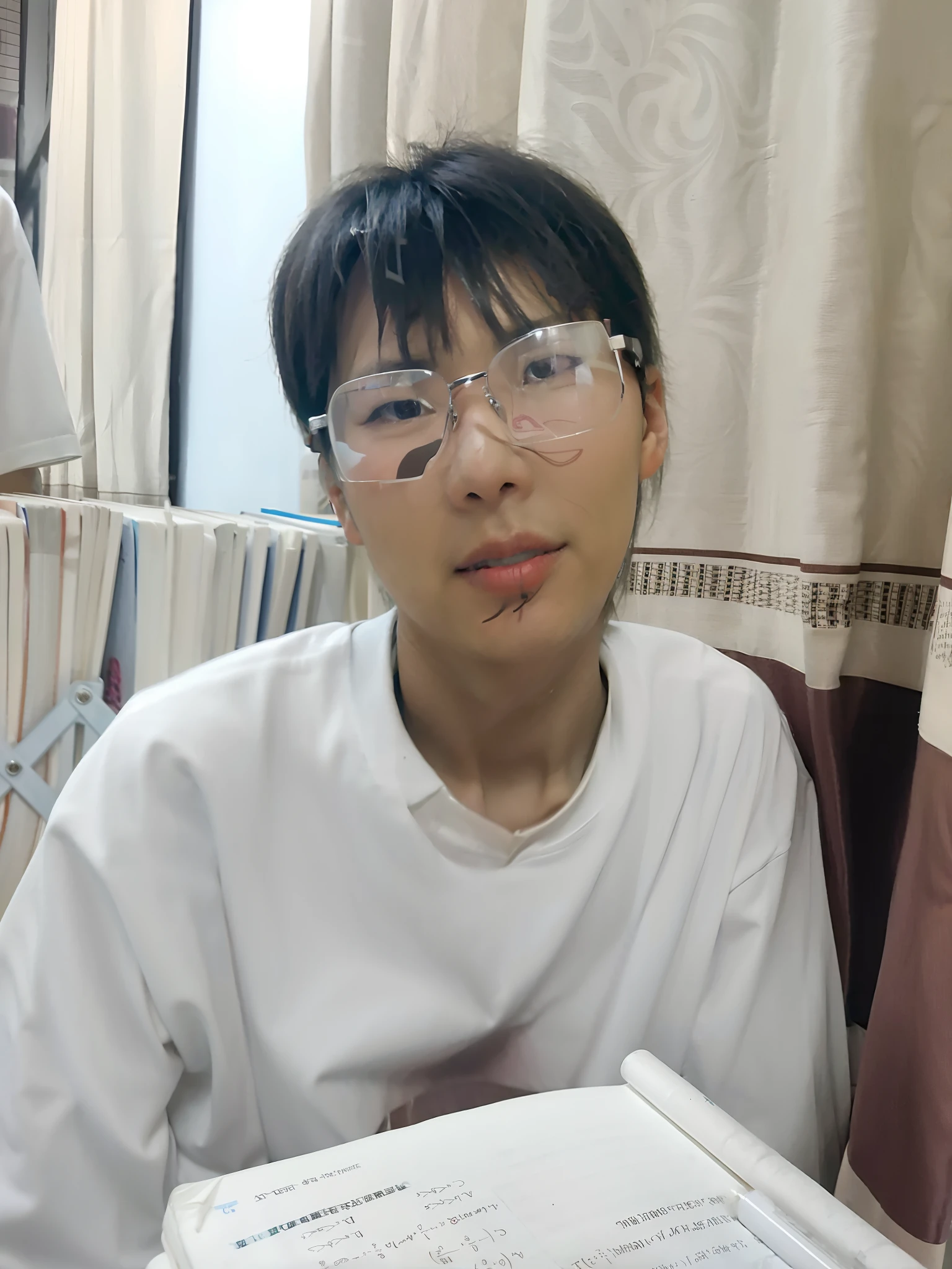 There was a man sitting at the table，Holding a book, 1 7 -  - old  thin face, with accurate face, With glasses, yanjun cheng, wears glasses, bao pham, Narrow Nose, wearing thin large round glasses, thawan duchanee, Very clear face, quy ho, Ruan cute vtuber