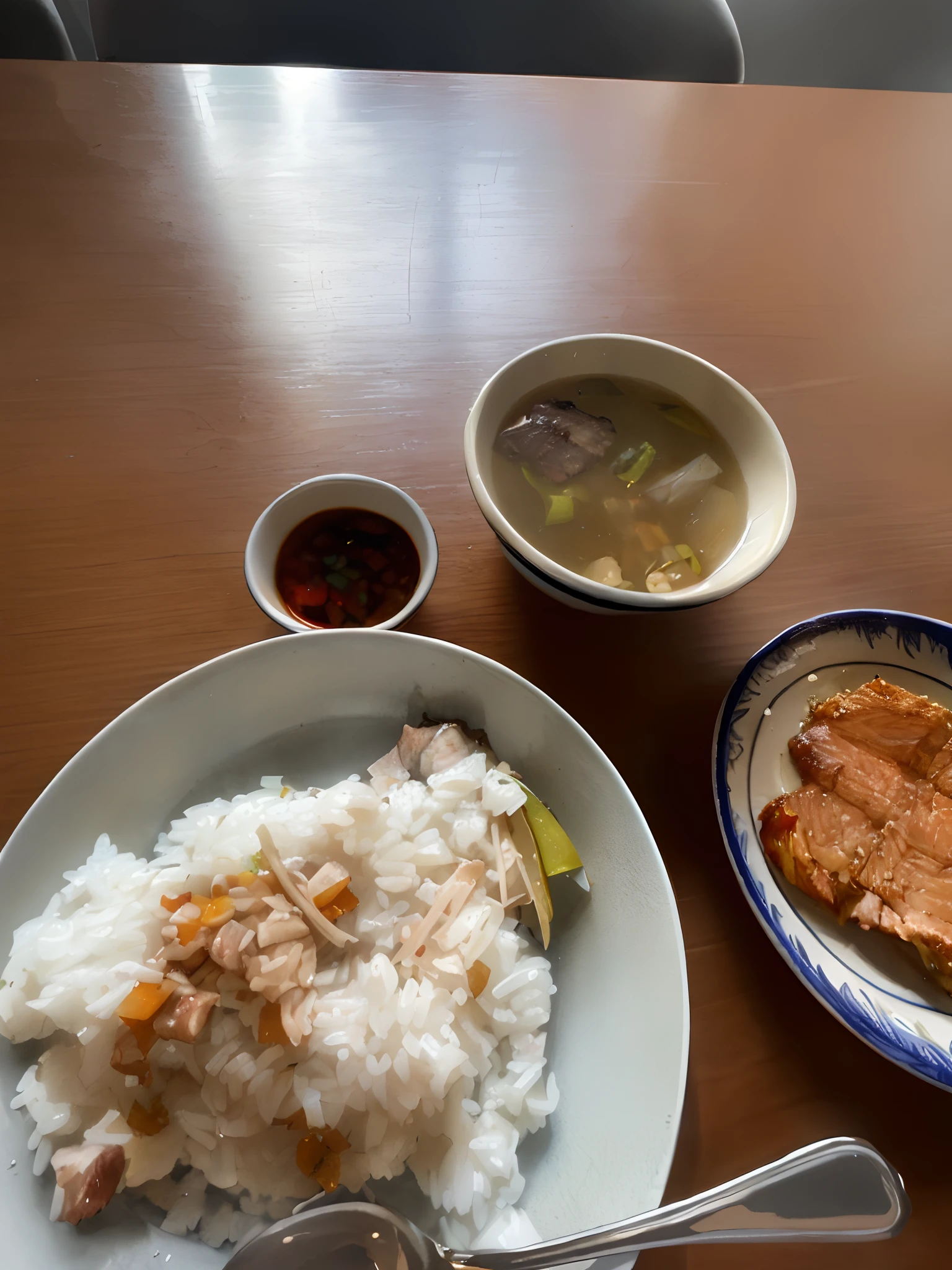 there is a plate of rice, meat and soup on the table, salmon khoshroo, in style of thawan duchanee, korean supper, in style of lam manh, daopao, closeup at the food, taken with sony alpha 9, taken with canon 8 0 d, inspired by Tan Ting-pho, soup, rice