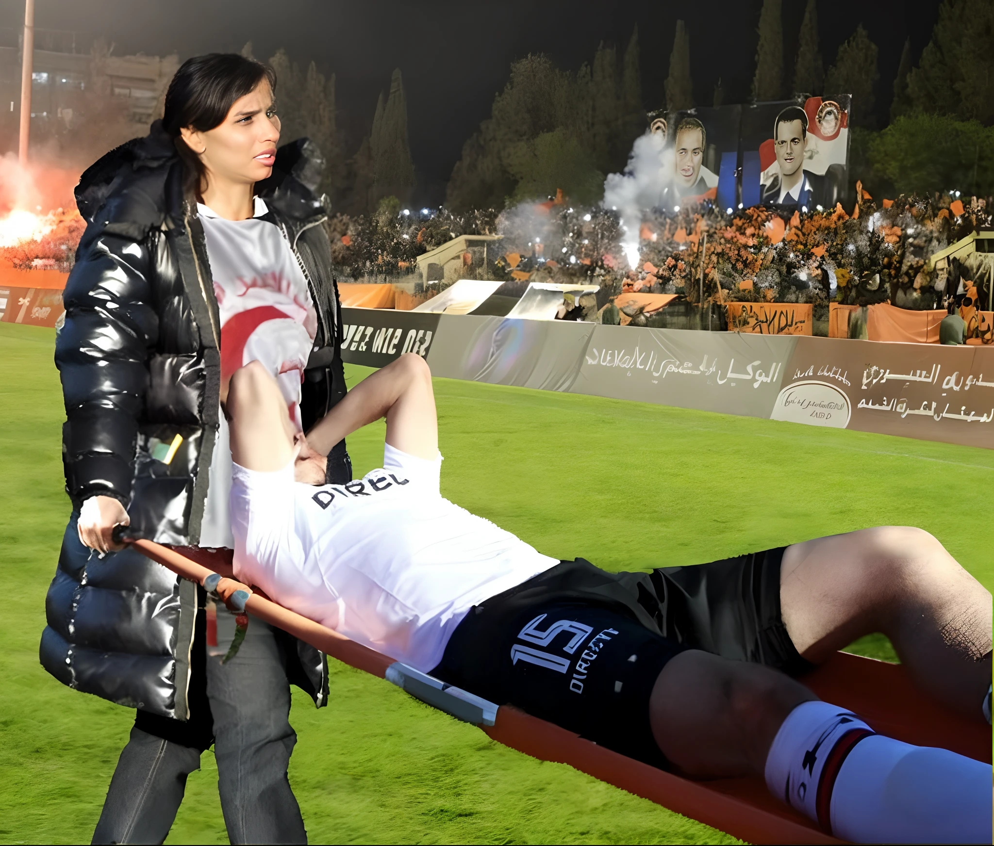 his hands are covering his face, the man has put his hands over his face, both hands are in front of his face, bald man on a stretcher being carried by a woman, a soccer scene in a stadium in italy , Jennifer Lopez in a black high-gloss plastic downcoat in front of us with an angry face and an extremely horrified and desperate expression from right to left across the soccer field, Jennifer Lopez carries in a horizontal orientation a stretcher on which an injured footballer lies in dull and dusty blue sportswear, the footballer lies sideways on the stretcher with his legs slightly bent and his torso towards us and has both arms bent and hands in front of his face, the footballer's head on the trage lies close to Jennifer Lopez' deep black plastic downcoat and is concealed by the footballer's akimbo arms and hands, the footballer in the mat cotton sportswear has his hands clasped in pain in front of his face and radiates an aura of pain and sorrow, Jennifer Lopez in the shiny black plastic puffer coat carries the injured soccer player on the stretcher which she carries before our eyes over the soccer field, in the background you can see the occupied stands of the italian soccer stadium, a soccer game initaly, sports injury, transport on the stretcher, Jennifer Lopez, high-resolution photo, ultra-realistic photo, photorealistic shot, super high-resolution and sharp photo, shiny black plastic burka, best shot, impressive winning photo, realistic shot, perfect shot, injured, intense momentl, 📷