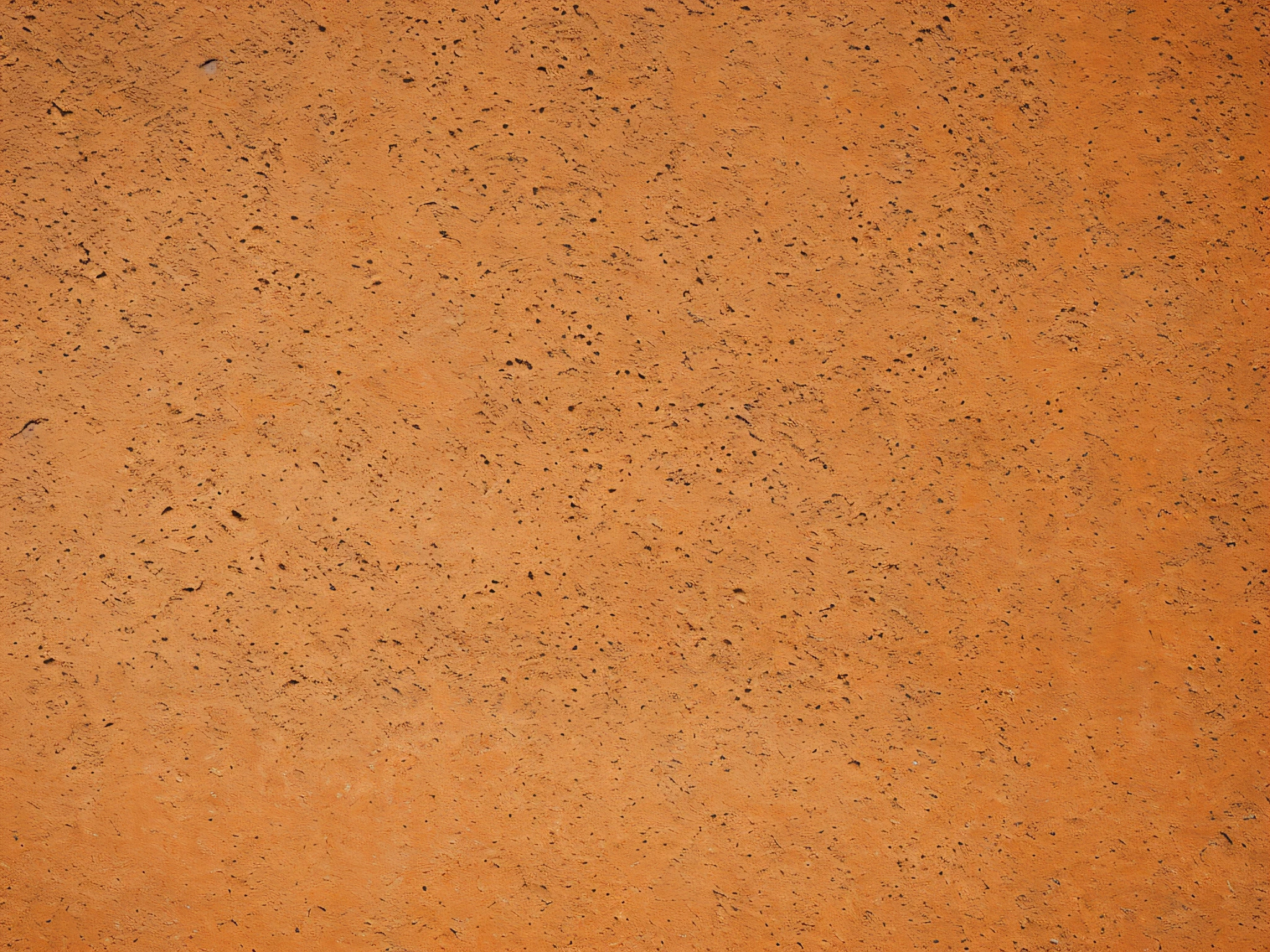 Wallpaper, photo of real concrete stone texture for light orange color background, on light orange cemented wall, vintage and abstract touch