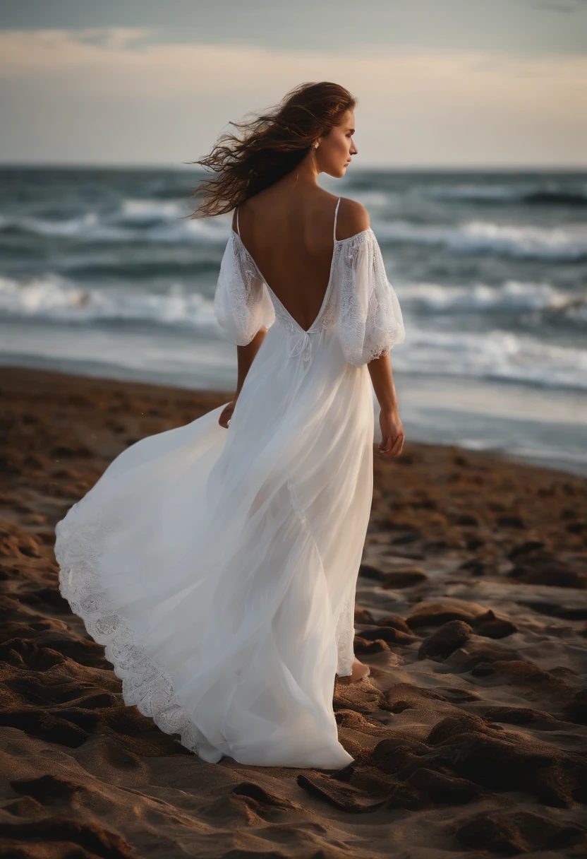 Girl in white dress on the seashore