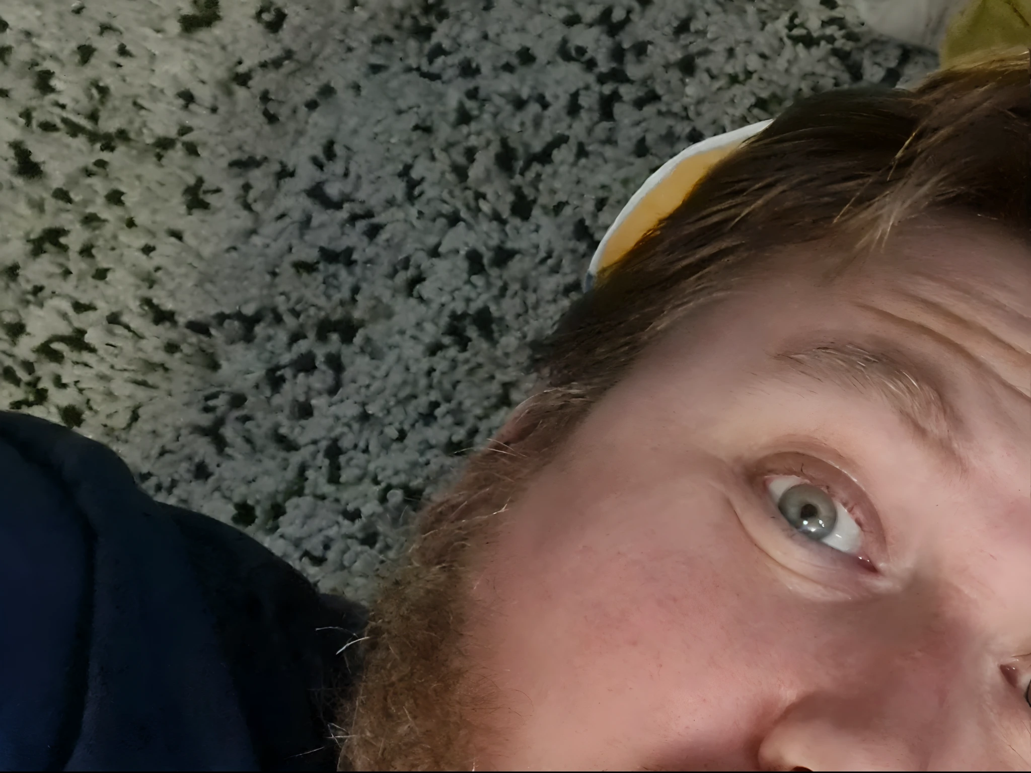 there is a man and a baby laying on a blanket, very silly looking, looking down on the camera, father with child, laying on their back, holding it out to the camera, passed out, reddit post, looking up at the camera, glaring at the camera, looks directly at camera, staring into the camera, looking directly at the camera