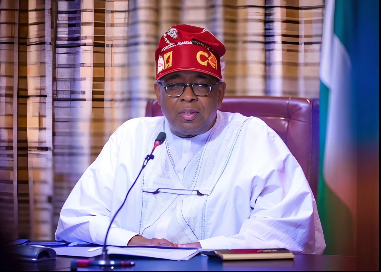 a man in a red hat sitting at a desk with a microphone, 🦩🪐🐞👩🏻🦳, adebanji alade, a handsome, trending photo, by Chinwe Chukwuogo-Roy, 2 0 2 2 photo, well edited, by Bernardino Mei, edited, high picture quality, 😭 🤮 💕 🎀, multiple