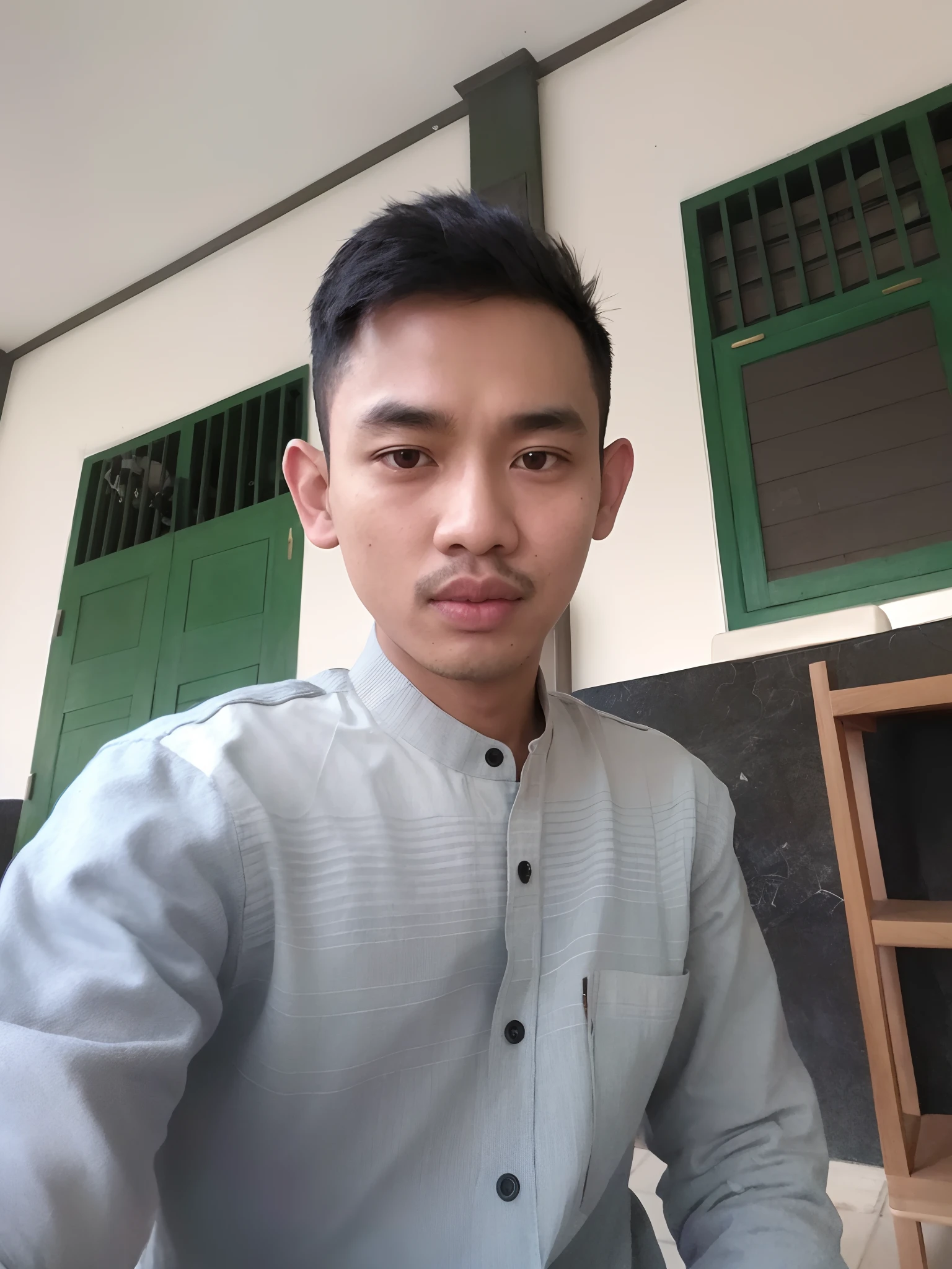 there is a man that is sitting down with a plate of food, raden saleh, potrait, student, with accurate face, young picture, south east asian with round face, protrait, ismail, ayan nag, nivanh chanthara, ramil sunga, front profile!!!!, thawan duchanee, by Abidin Dino