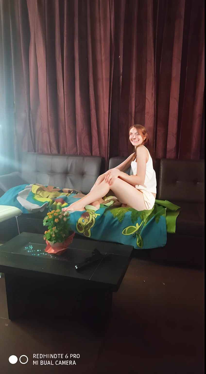 19 years old girl, hirsute long orange hair, green eyes, smiling, sitting