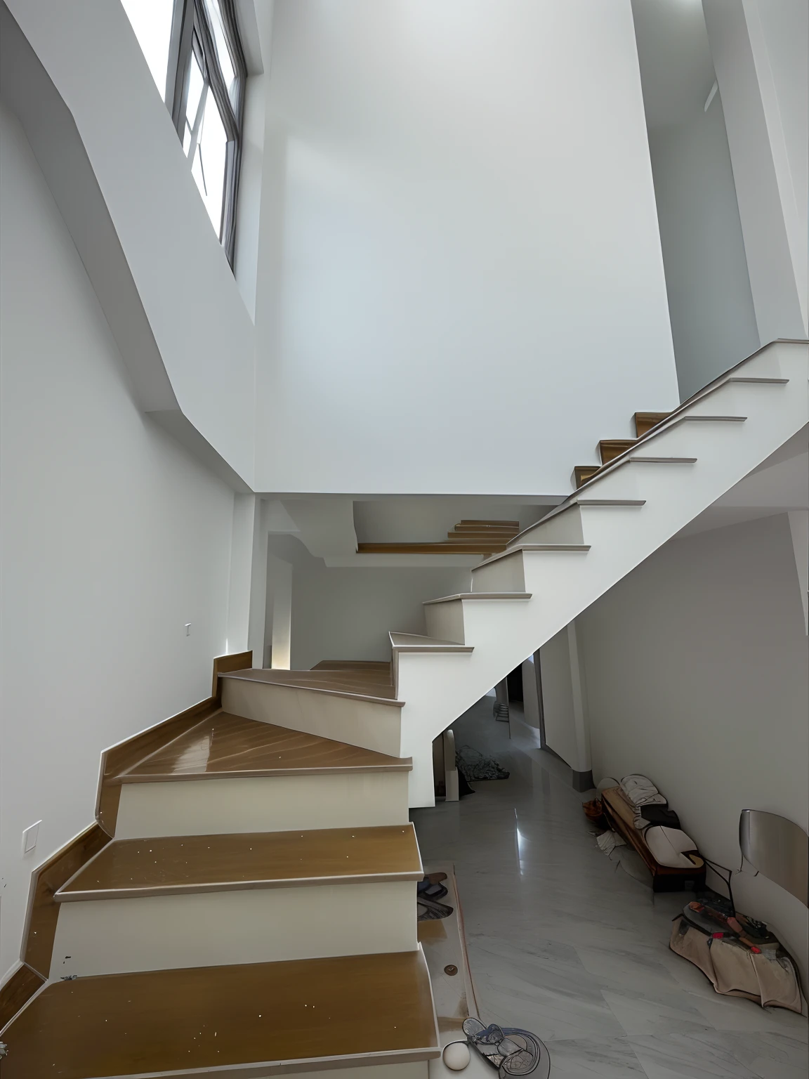 there is a staircase in a building with a skylight above it, staircase, stairs, stairs to the second floor, 1 staircase, stairs to an upper floor, taken with sony alpha 9, staircases, penrose stairs, taken with sony a7r camera, large staircase, stairway, with backdrop of natural light, arhitectural shot, tall ceiling