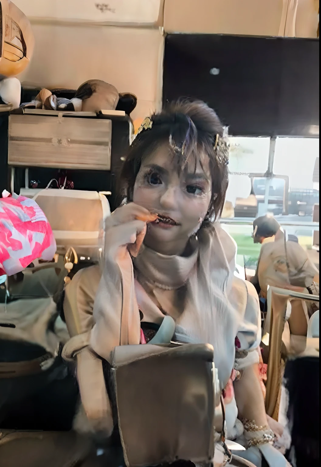 woman sitting at a table wearing a white wedding gown with tattoo sleeves a laptop and a glass of wine, very very low quality picture, deep in thought, at a dinner table, looking to the side off camera, low quality video, low quality photo, having an awkward dinner date, taken in the early 2020s, looking away from viewer, low quality footage, sitting at table
