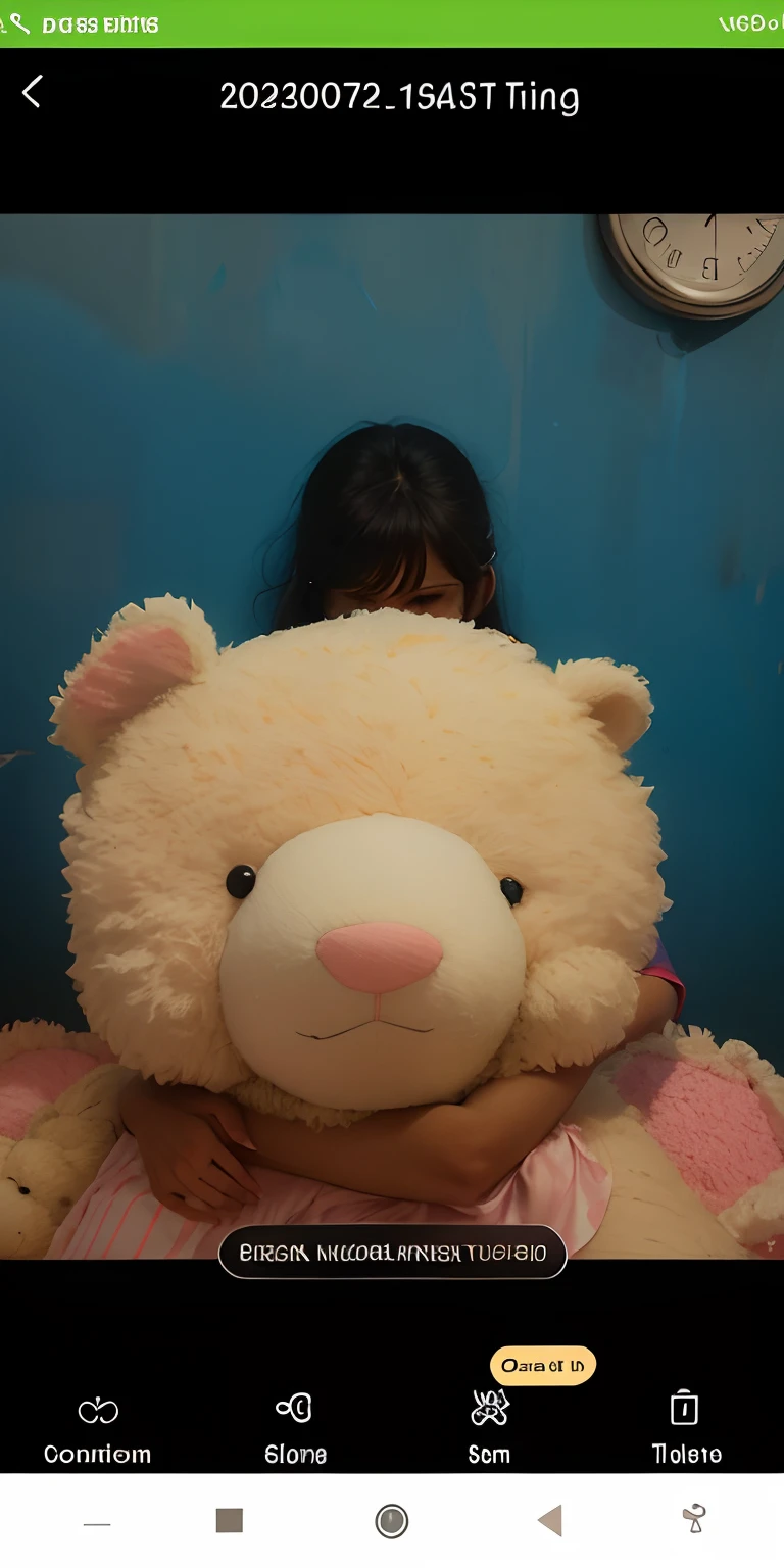 Girl hugging a teddy bare.