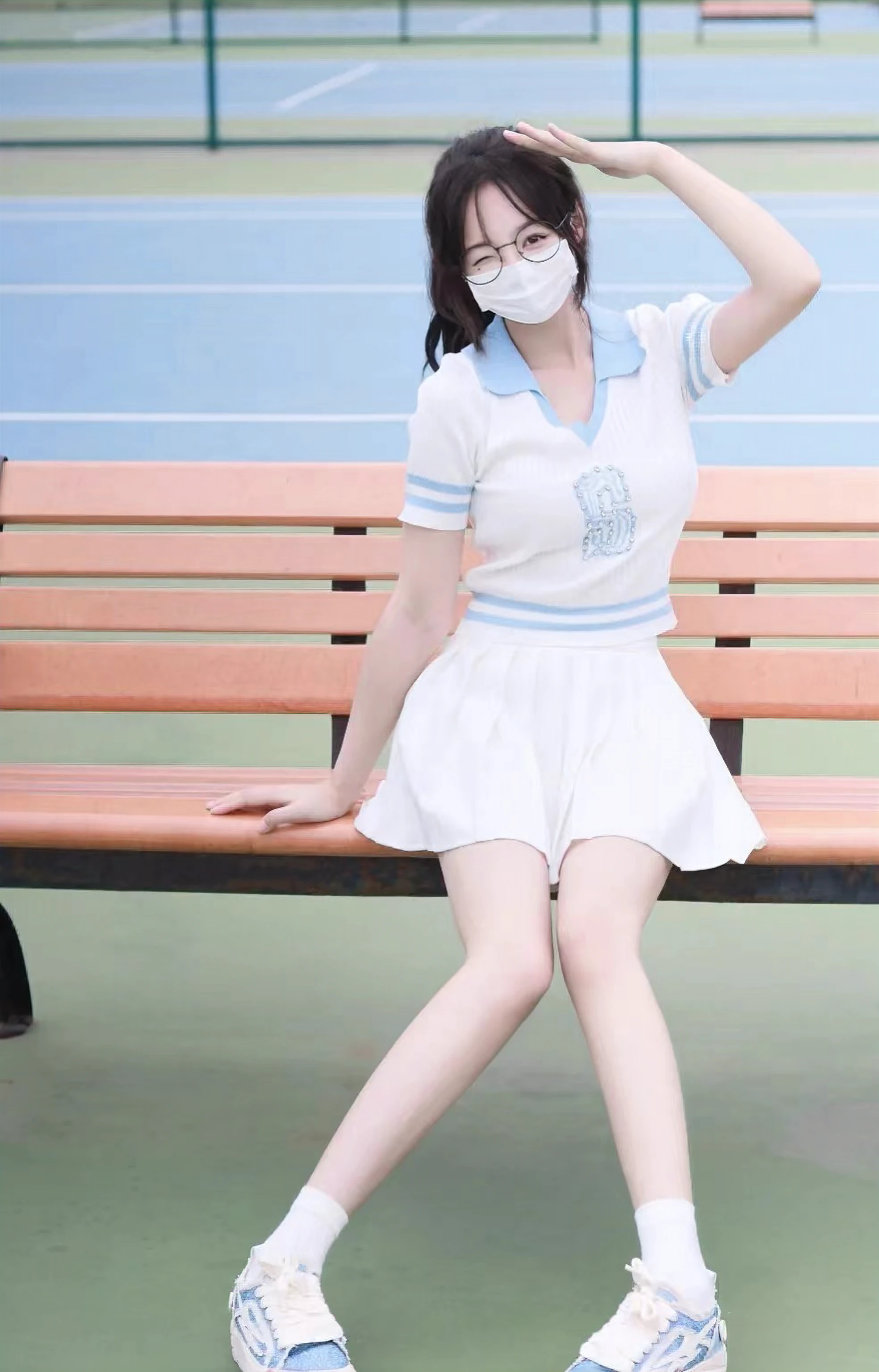 An Arad woman in a white tennis uniform sits on a bench, Anime girl cosplay, japanese girl school uniform, White uniform, smooth white tight clothes suit, tennis wear, 8K)), sakimichan hdri, wearing a Japanese school uniform, Magical school student uniform, pale snow-white skin, Japanese school uniform, Anime girl in real life, belle delphine