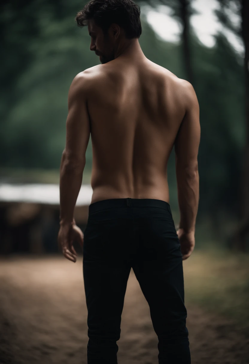 a boy who turned around showing his butt and wearing jeans with no shirt peeing himself