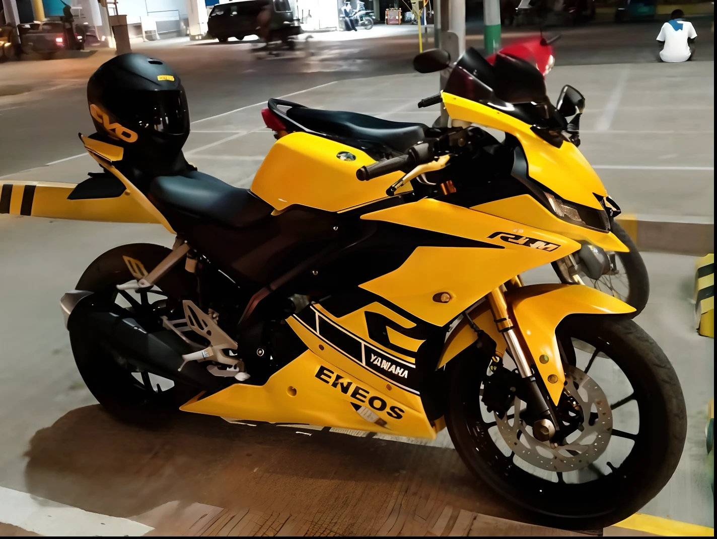 yellow motorcycle parked in a parking lot with other motorcycles parked nearby, glossy yellow, gtr xu1, yellow, black and yellow scheme, yellow and black, r6, black and yellow, yellow lighting from right, (((yellow))), yelow, taken in 2 0 2 0, by Exekias, yellow theme, yellow helmet, frontal picture, very beautiful masterpiece