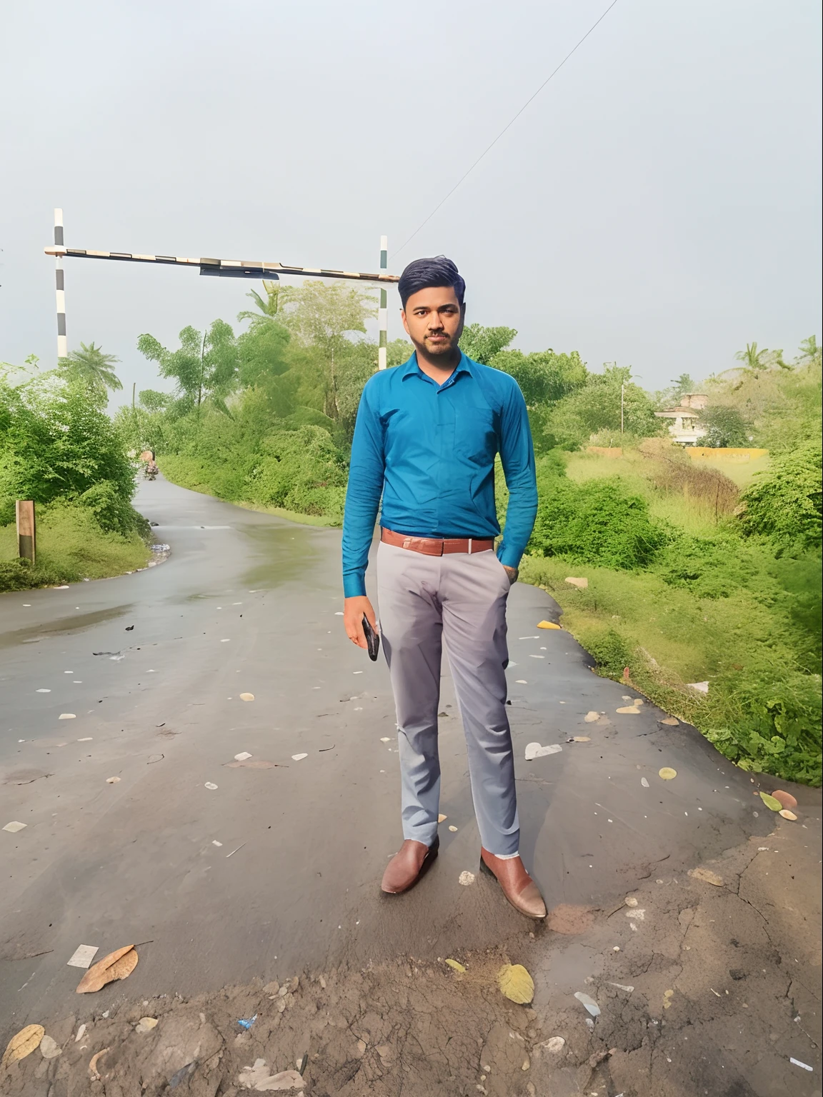 there is a man standing on a road with a blue shirt, standing in road, in front of a forest background, on a road, standing in township street, standing in a township street, distant full body view, very very low quality picture, standing in street, shot on nikon z9, taken with sony alpha 9, in a street, full body photogenic shot