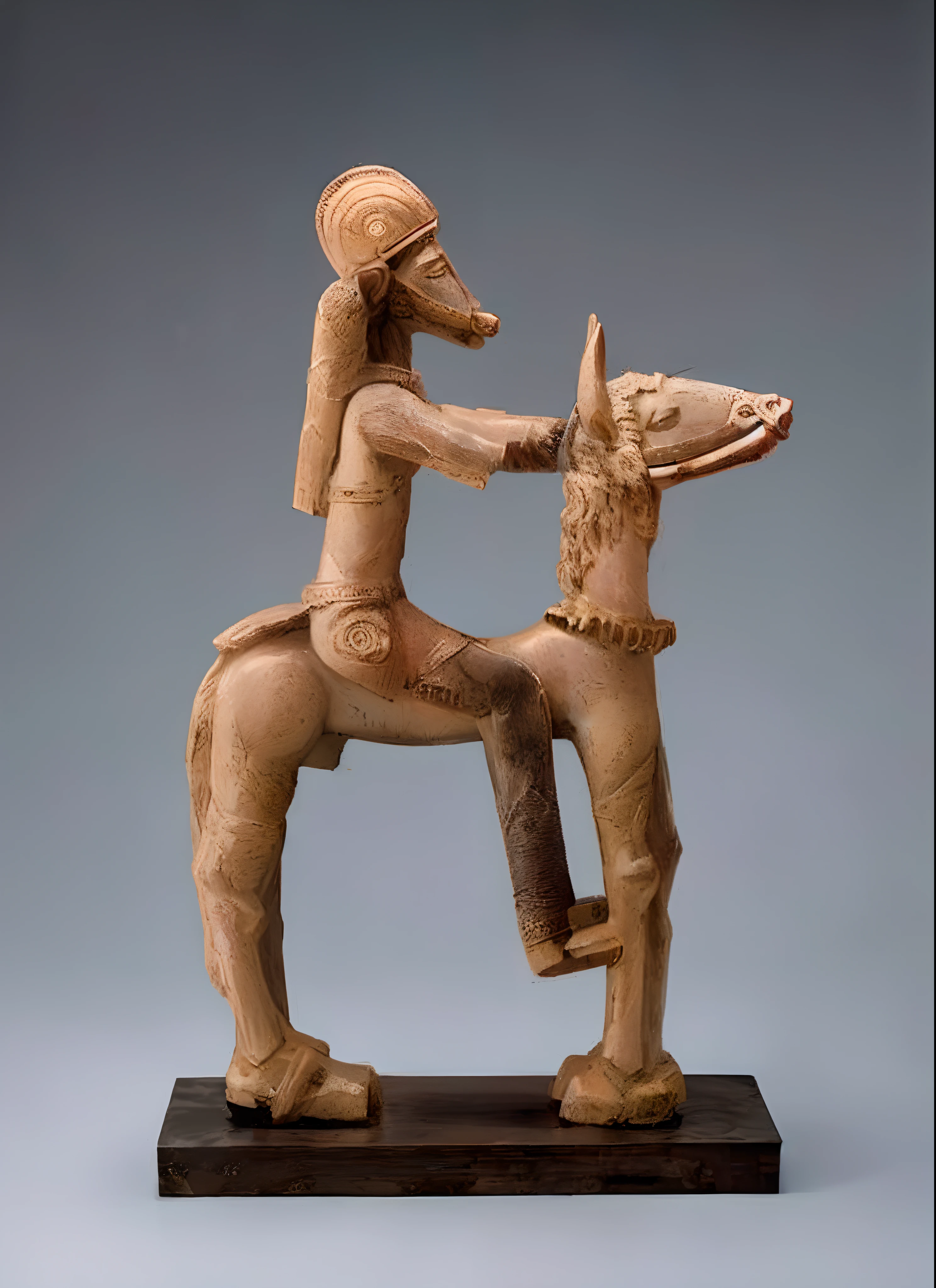 a close up of a statue of a person on a horse, anthropomorphic horse, male centaur centaur chimera, ifa deity, a centaur, centaur horse, centaur, horse rider, ancient”, photo courtesy museum of art, figurine, ancient antler deity, animal - shaped statue, centaur from greek mythology, guy with horse head, cartoon, comic style cartoo,
