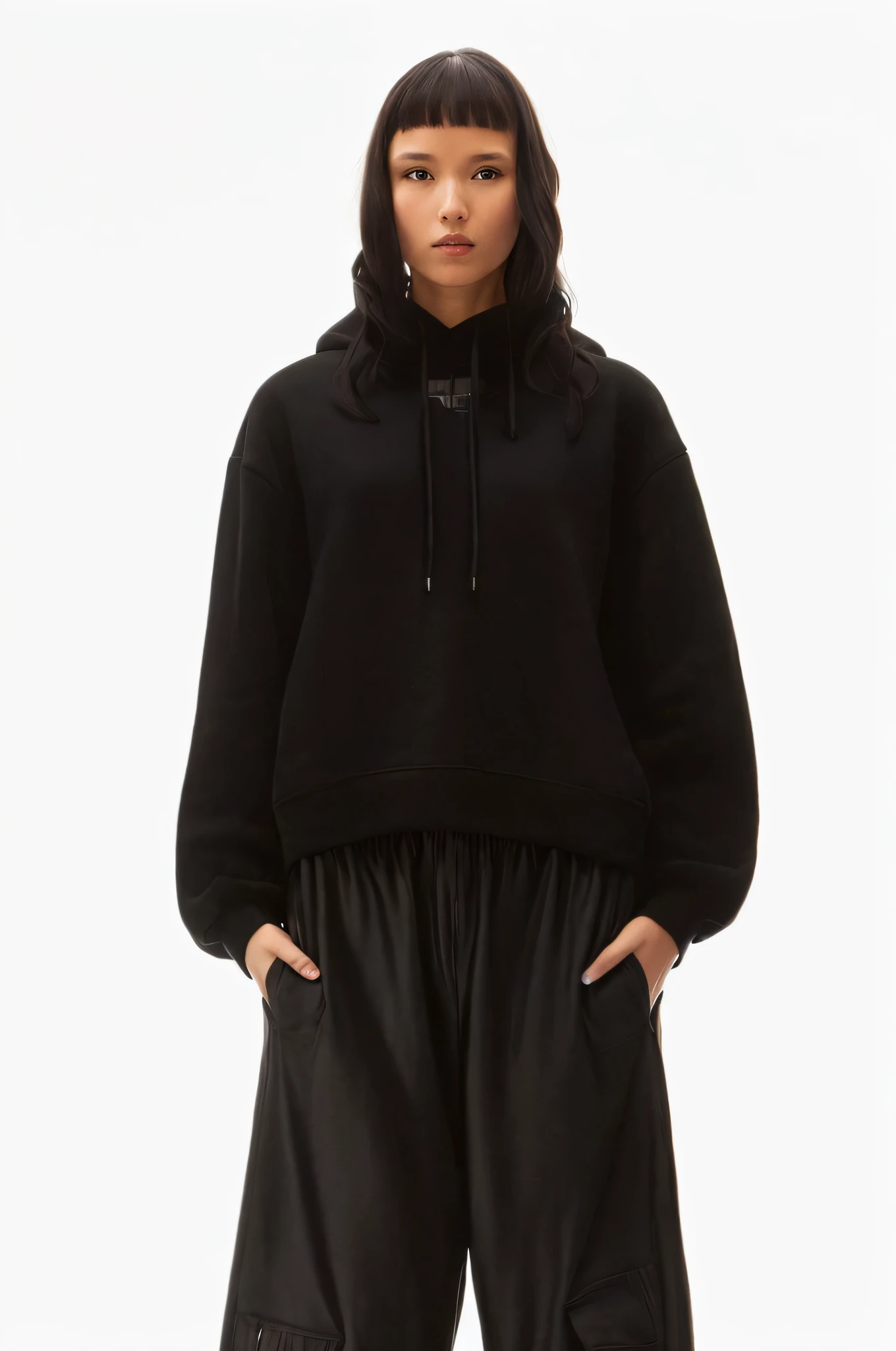 a woman in a black sweatshirt and black pants stands with her hands in her pockets, hodie mihi cras tibi, helmut lang, in a black hoodie, wearing a black hoodie, dressed black hoodie, full product shot, calvin klein, oversized hoodie, inspired by Wang E, hoody, wearing an oversized hoodie, black hoodie techie, black hoodie