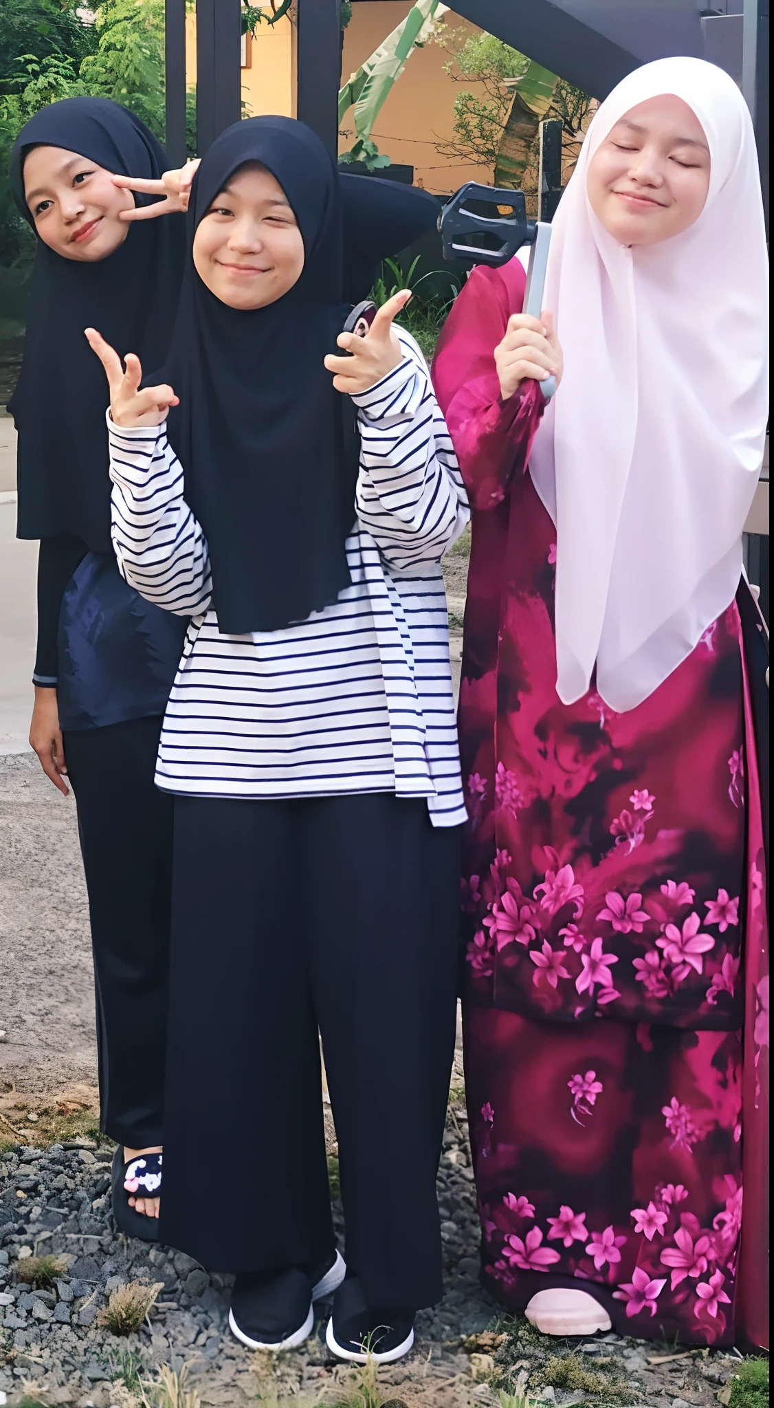 three women in hijabs pose for a picture while holding up their hands, wearing authentic attire, malaysian, modest!, inspired by Naza, wearing traditional garb, old picture, wearing correct era clothes, ((oversaturated)), with her long, inspired by Ni Duan, inspired by Ni Yuanlu, with index finger