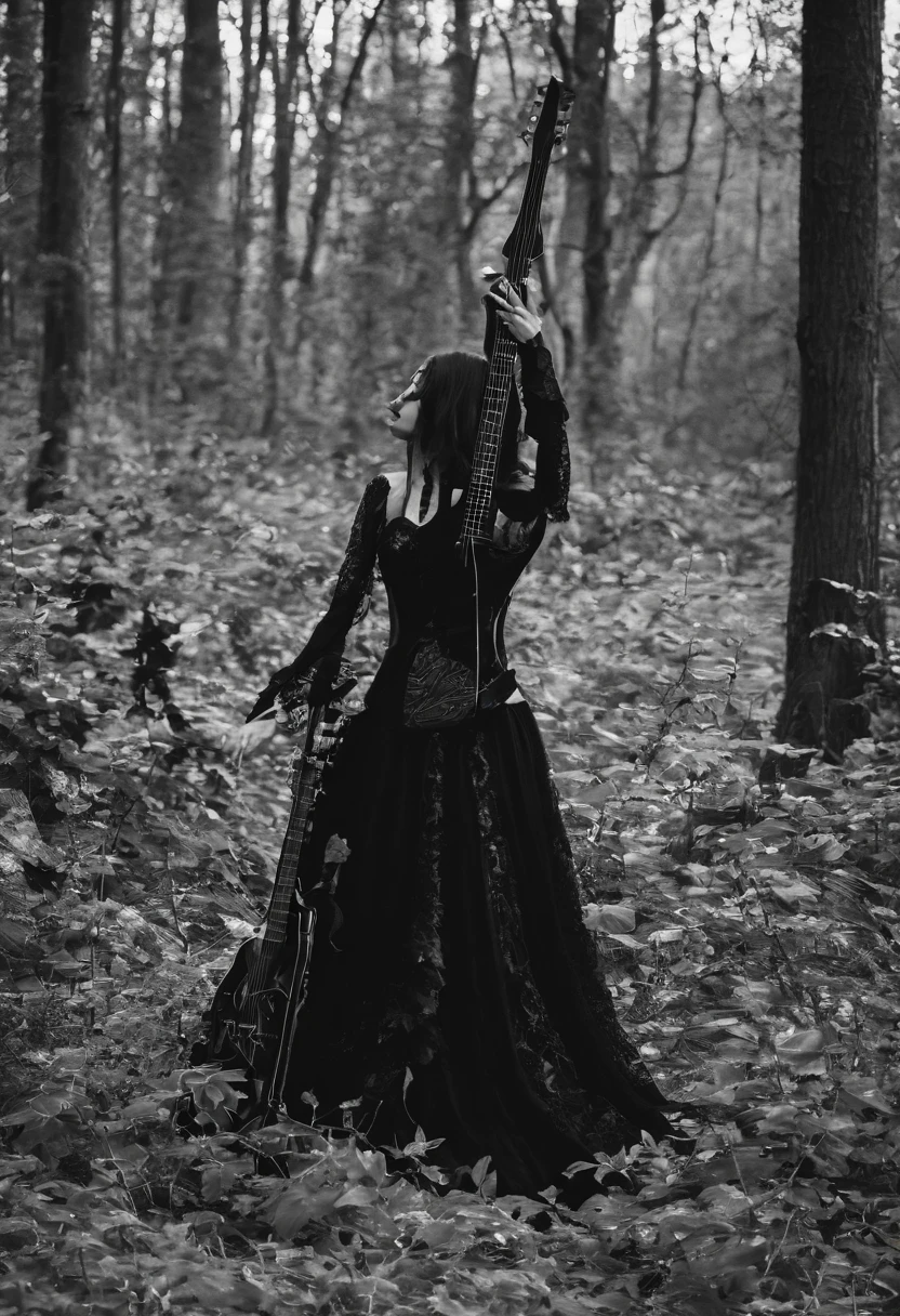 Metaleiro sexy com sua guitarra na floresta