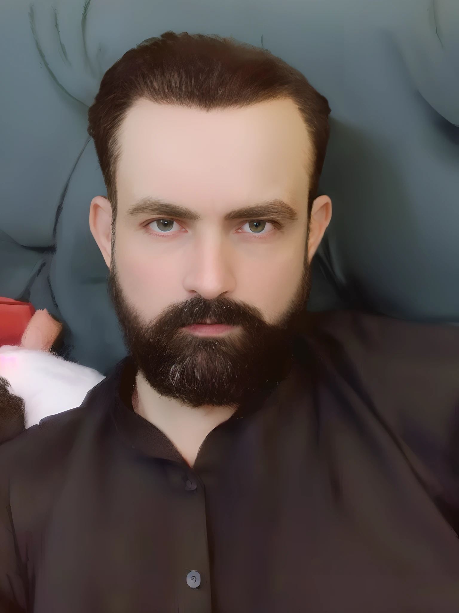 there is a man with a beard and a cat laying on a couch, with a full black beard, kyza saleem, without beard, 4 0 years old man, about 3 5 years old, handsome man, without beard and mustache, very very low quality picture, 8k selfie photograph, profile pic, with a beard and a black shirt, profile photo