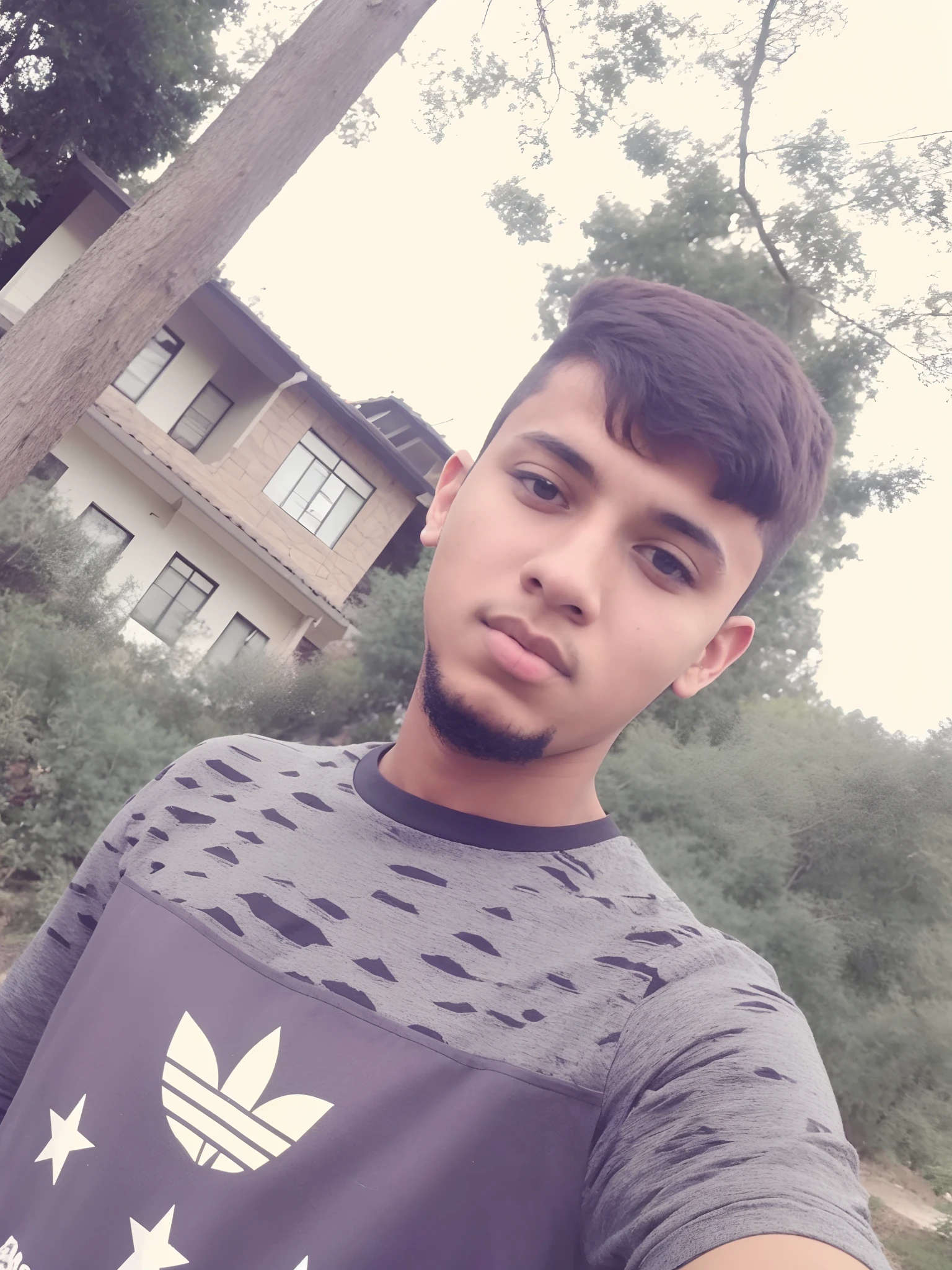 there is a man that is taking a selfie in front of a house, around 1 9 years old, riyahd cassiem, 18 years old, ismail, 1 6 , facebook profile picture, mohamed chahin, ash thorp khyzyl saleem, 1 9 year old,saleem, profile pic, ayan nagnge