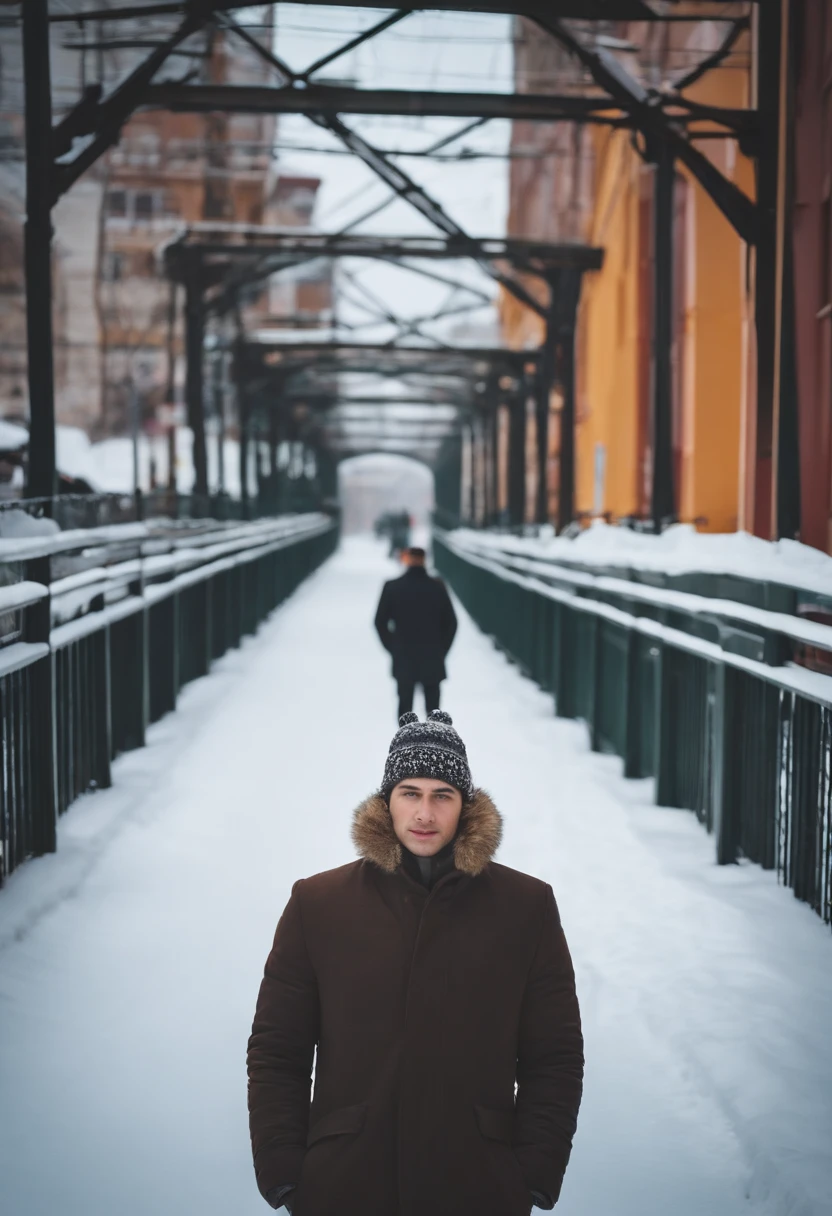 young tall man in vladivostok, in winter, snow, bridge