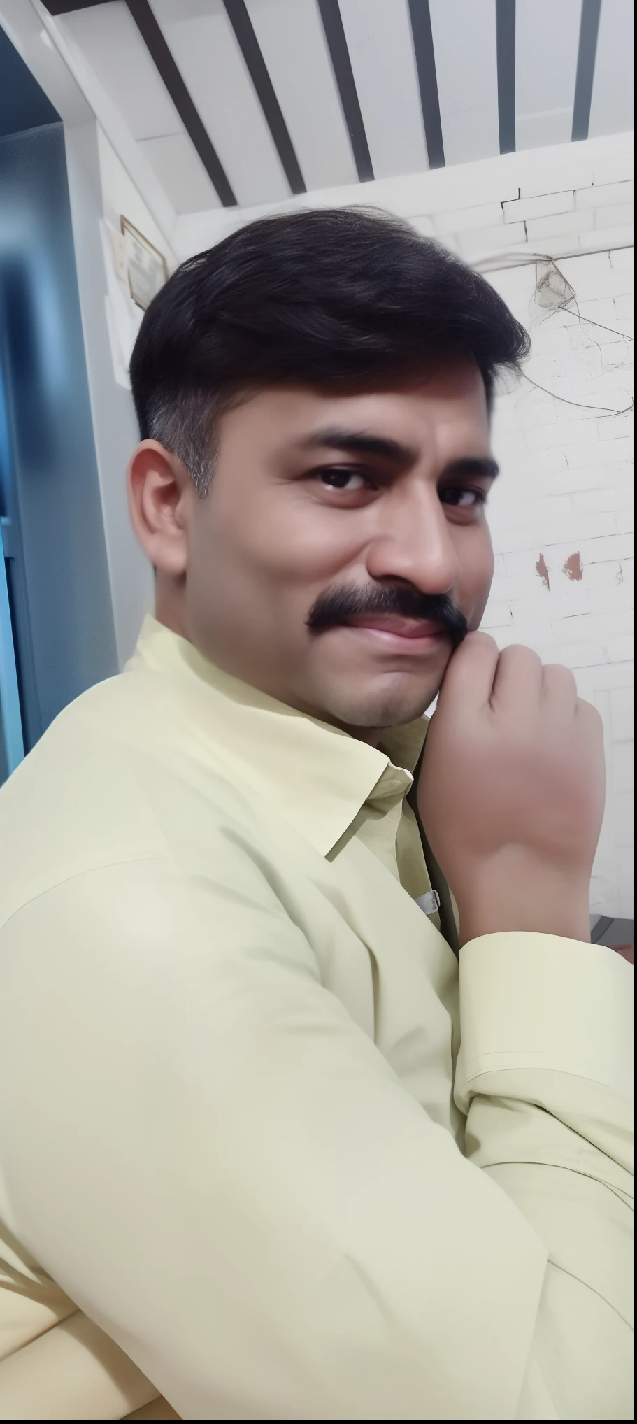 there is a man that is sitting down with a mustache, very very low quality picture, vastayan, vinayak, with accurate face, 4 0 years old man, profile pic, about 3 , very clear picture, portait photo profile picture, without helmet, around 1 9 years oldf a man, without beard