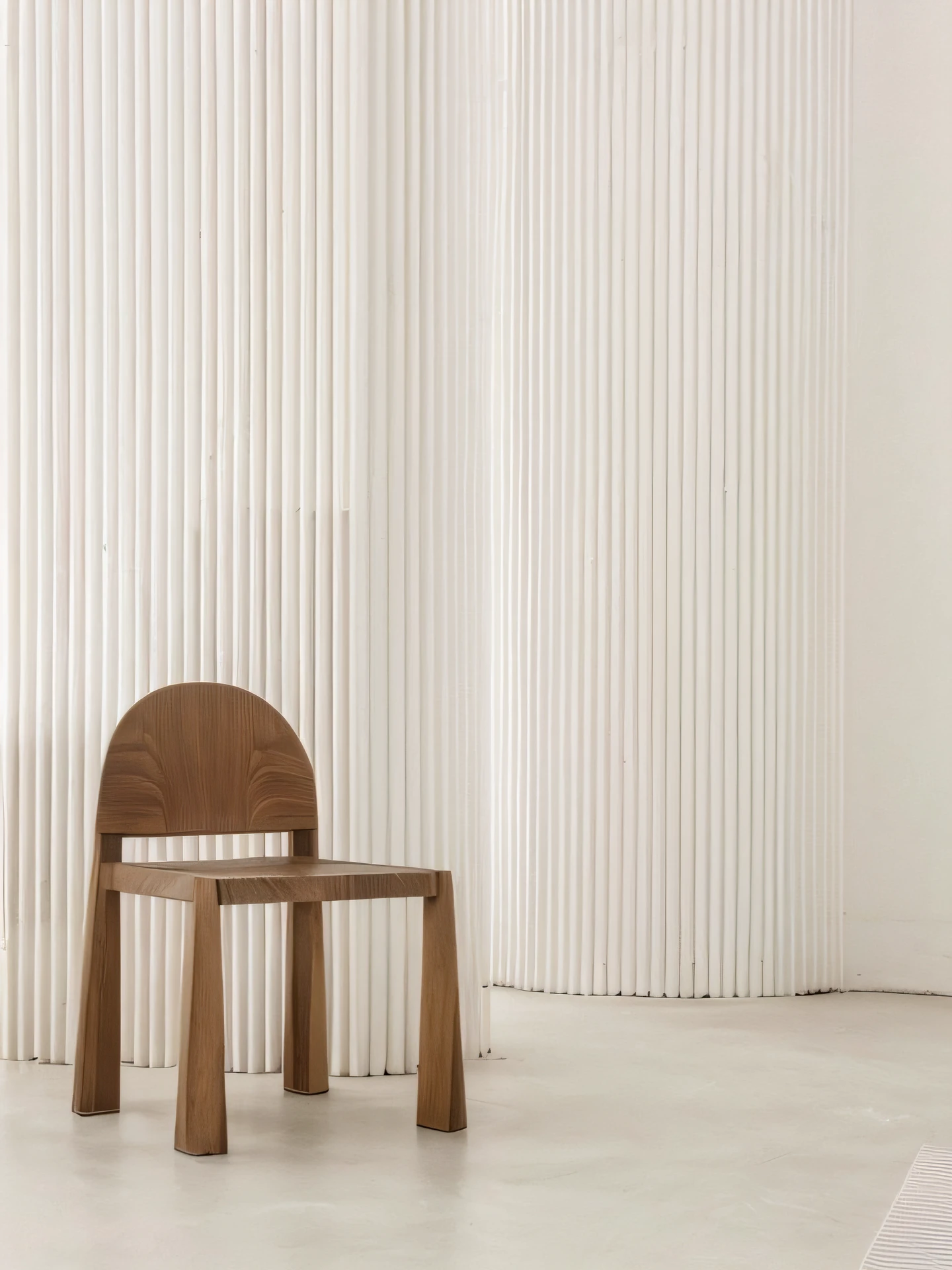 There is a chair in front of the wall, wooden chair, inspired by David Chipperfield, minimalist furniture, furniture design, curved furniture, designer furniture, a chair, wood carved chair, inspired by Constantin Hansen, chair, inspired by Reinier Nooms, Ed Cartier, single chair brass, Cyclades! Sculptural style
