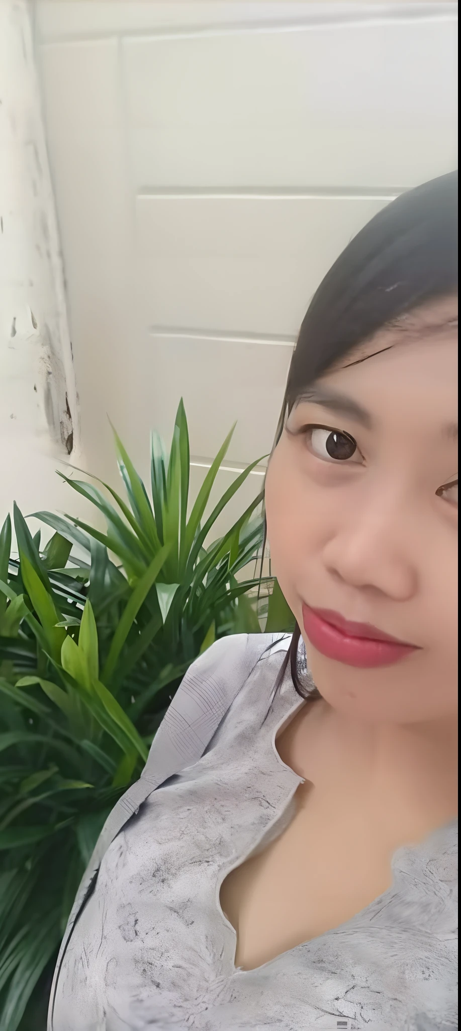 a close up of a woman with a cell phone in her hand, 3 0 years old woman, 30 years old woman, 2 7 years old, 2 9 years old, 2 8 years old, in style of lam manh, 3 2 years old, dang my linh, nivanh chanthara, 38 years old, an asian woman, big breast, nude