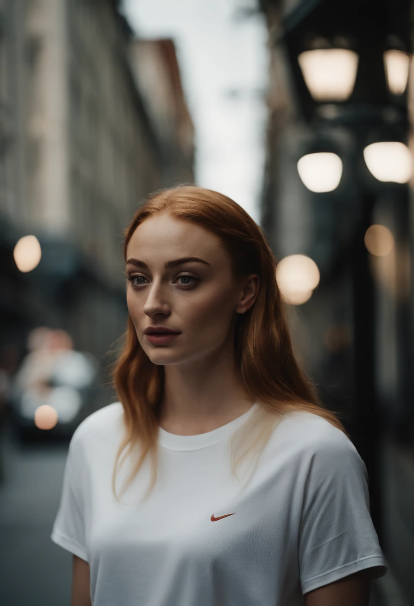 sophie turner wearing nike shorts and an oversized white t-shirt. film photograph, city street.