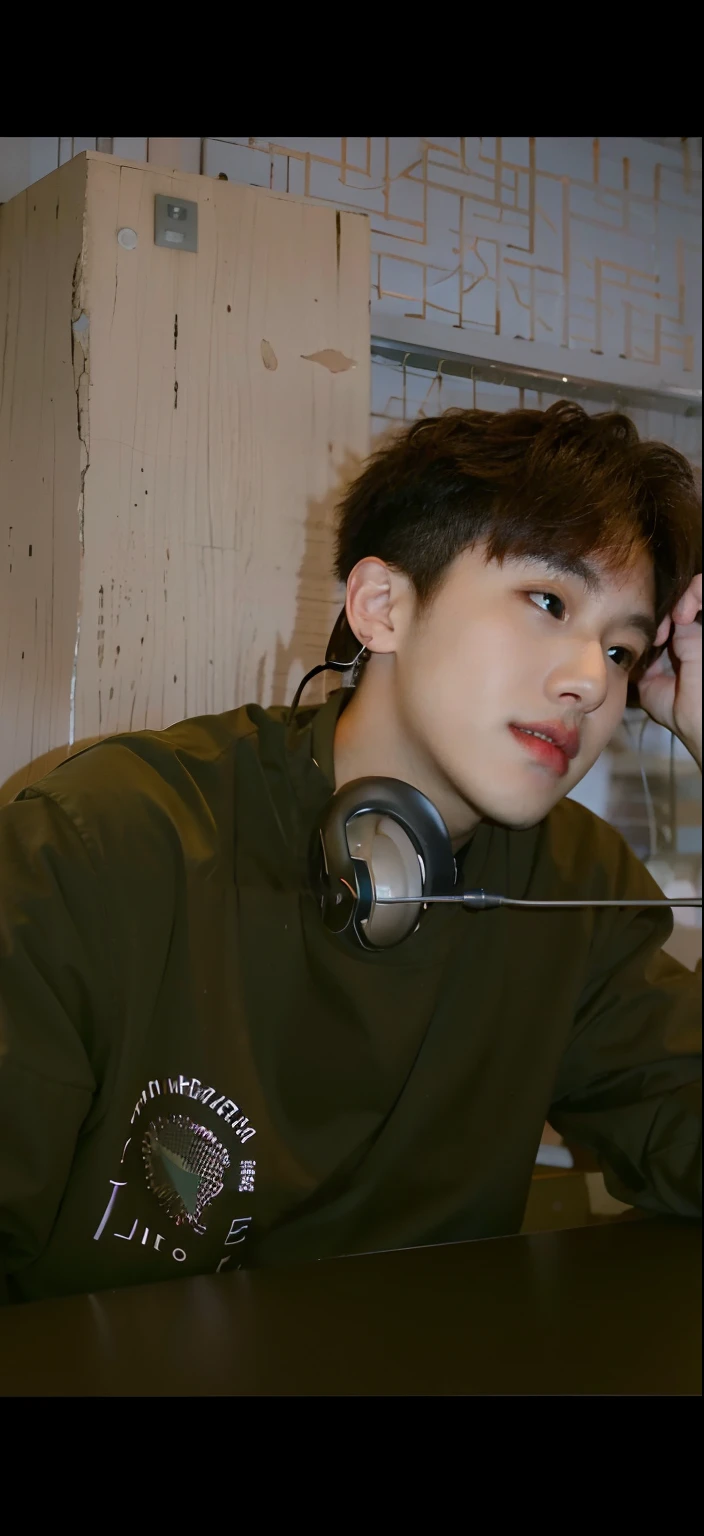 there is a man with headphones on sitting at a table, cai xukun, profile picture 1024px, jungkook, male ulzzang, inspired by Kun Can, inspired by Bian Shoumin, hyung tae, young wan angel, profile pic, album art, headshot profile picture, jinyoung shin, hong june hyung, yanjun chengt