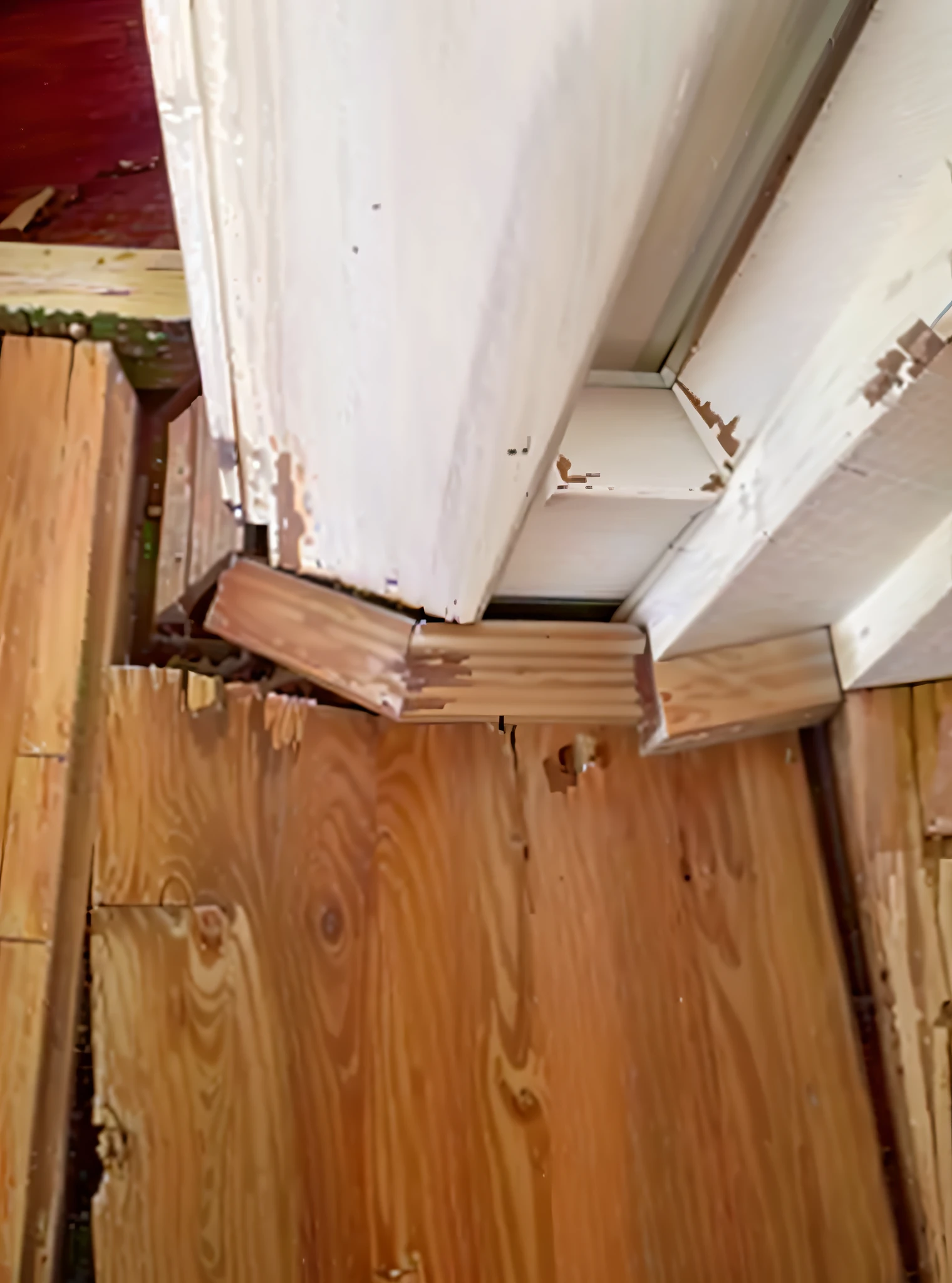 a close up of a wooden floor with a hole in it, collapsed floors, damaged floor, pinned joints, hardwood floor boards, about to enter doorframe, old wood floors, bottom made half wood, wooden casing, cracked and faded in places, wooden trim, some edges lost, cracked varnish, wood floor, wooden floor boards, hardwood floor, water damage