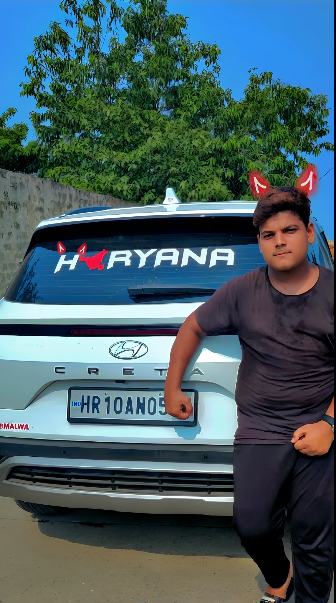arafian man standing next to a car with a crown on his head, front profile!!!!, profile picture 1024px, reyyan, very very low quality picture, # myportfolio, taken with sony alpha 9, high quality picture, vinayak, ayan nag, ๐๐๐โบ๐๐๐, high quality upload, full body picture