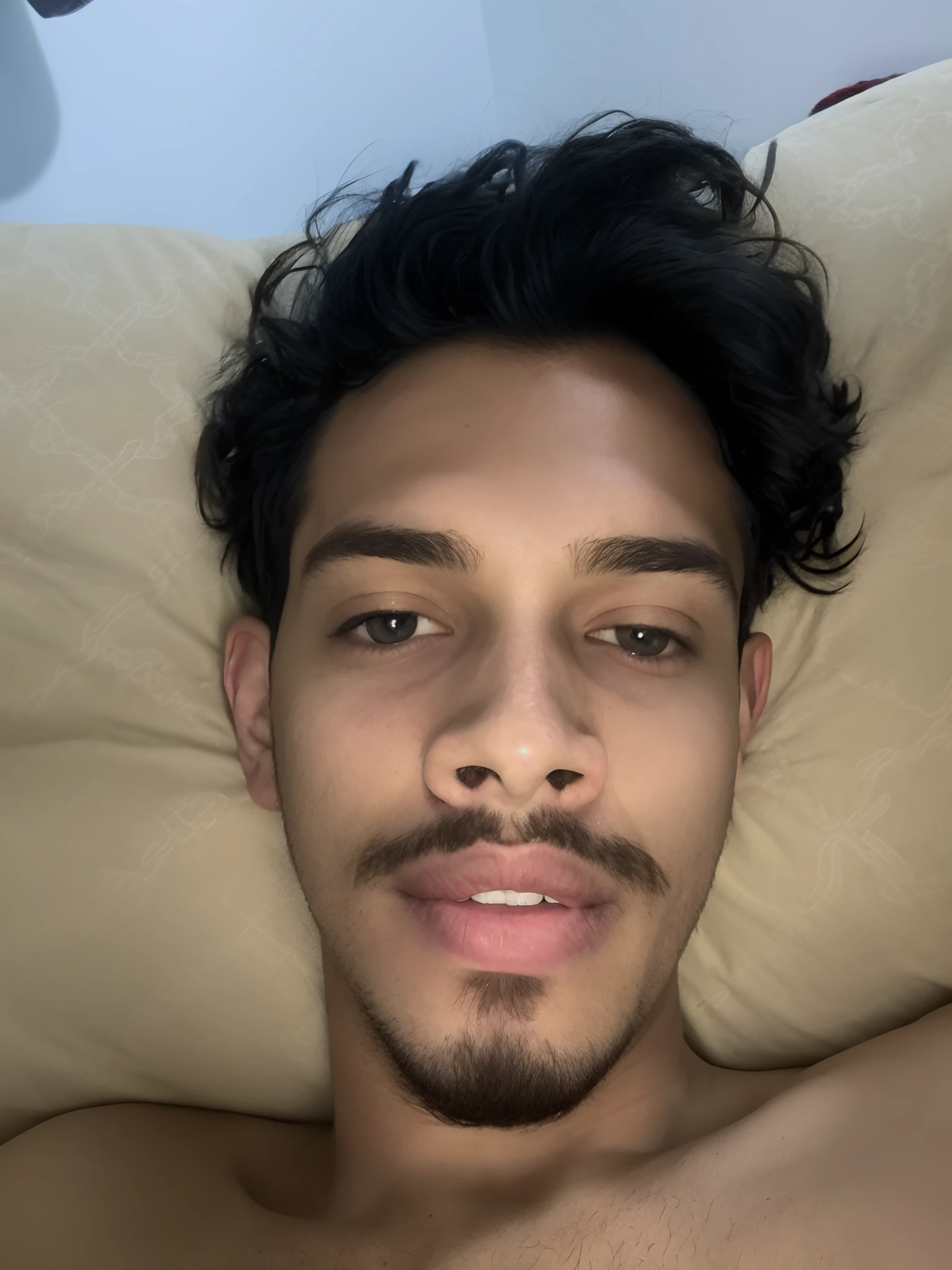 there is a man laying in bed with a remote control, taken in the early 2020s, around 1 9 years old, 2 2 years old, 2 3 years old, tired face, face picture, 18 years old, chilled out smirk on face, 2 7 years old, poorly lit, 21 years old, very ugly face