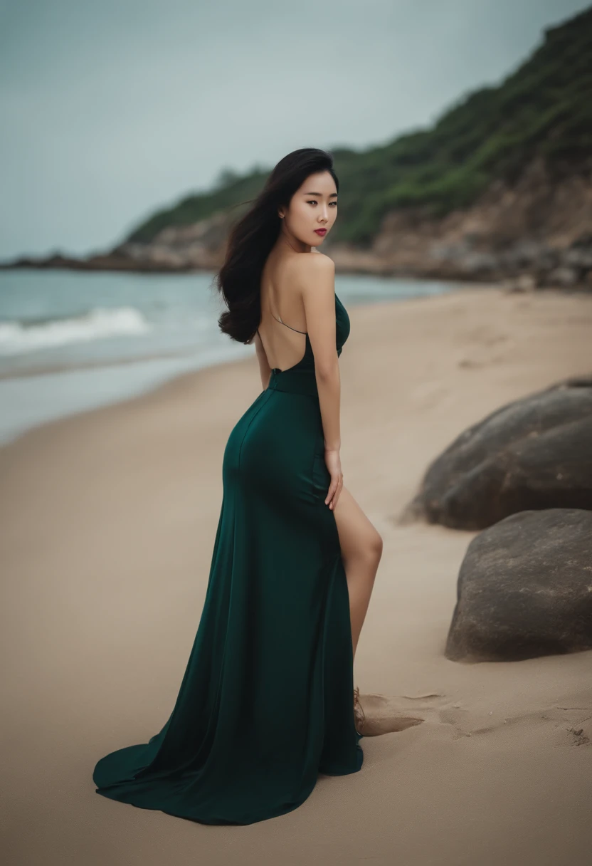 Korean woman with beautiful shape of rounded waist and perfect back on the beach is looking at camera、Black hair straight long hair