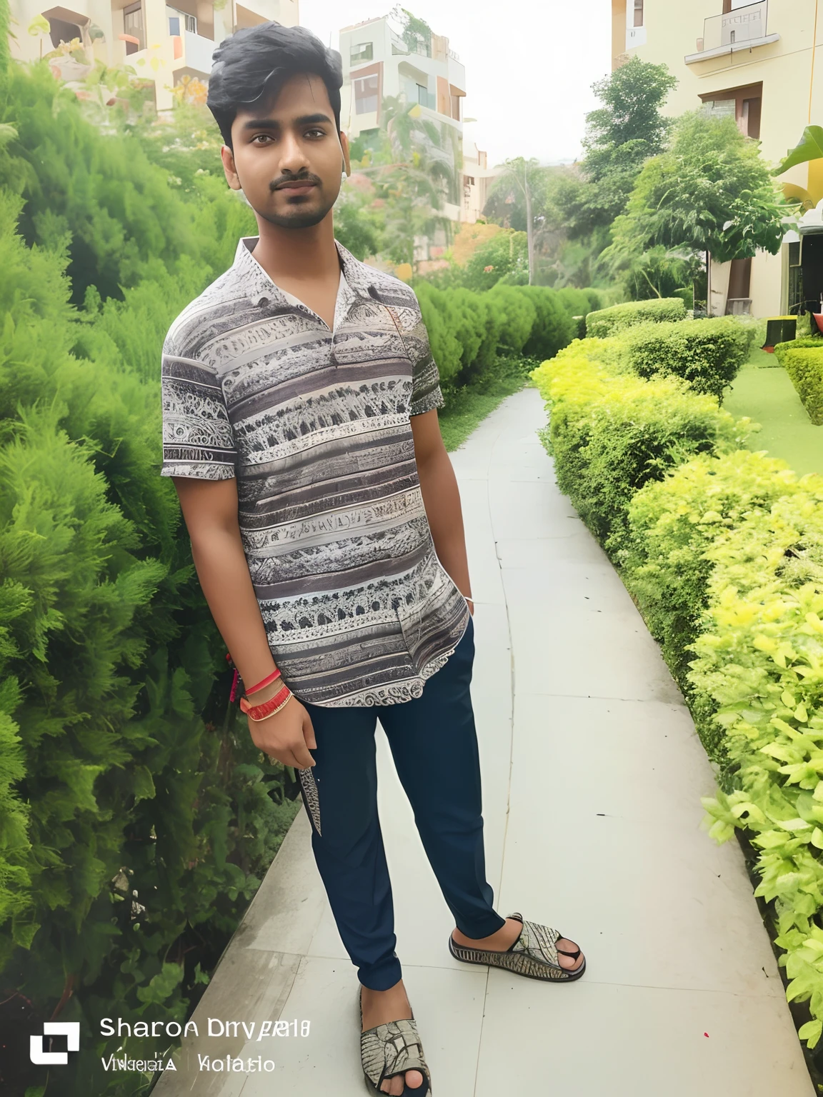 arafed man standing on sidewalk in front of bushes and buildings, around 1 9 years old, full body picture, vinayak, inspired by Saurabh Jethani, vastayan, with accurate face, candid picture, inspired by Bikash Bhattacharjee, jayison devadas, in sunny weather, mohamed chahin, nivanh chanthara