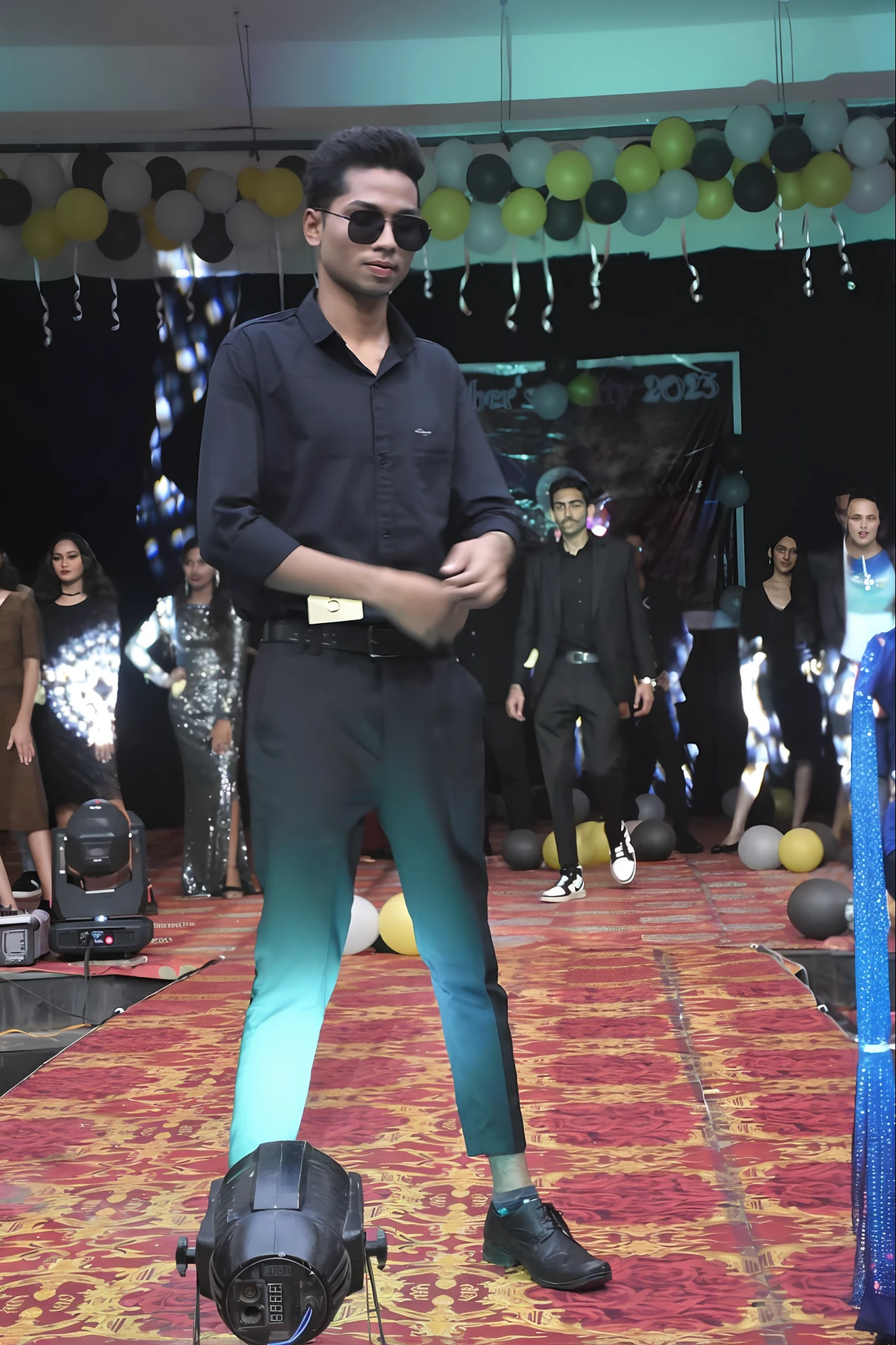 araffe dressed in black and blue standing on a stage with a crowd of people, fashion show, fashion show photo, performing on stage, music show, fashion show runway, mohamed chahin style, fashion runway, live performance, dance music show, on the runway, stylish pose, he is dancing, fashion model, crazy fashion catwalk, stylish deity