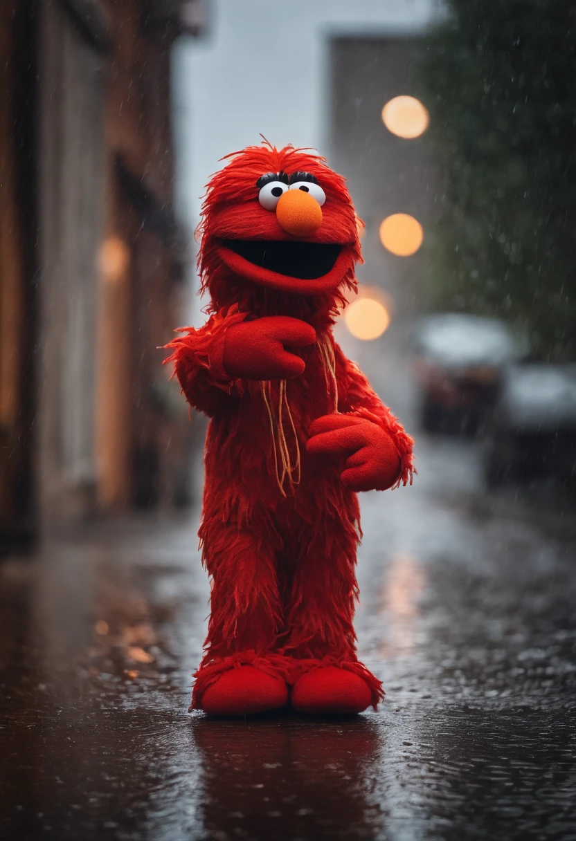 Elmo who is a red puppet with a orange nose is wearing a hoodie in the pouring rain sitting down he is upset